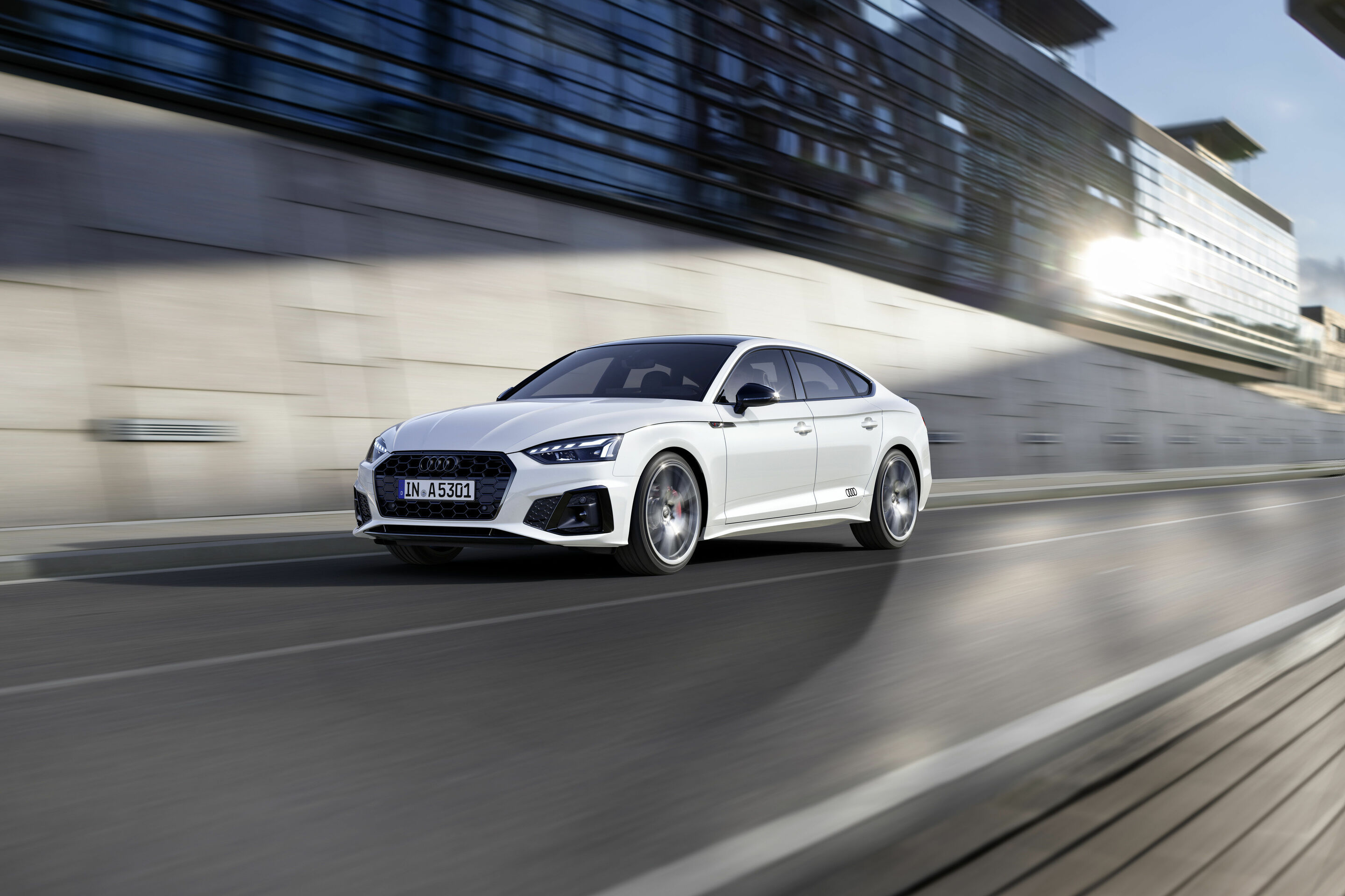 Audi A5 Sportback S line competition plus (2021) - Dynamic photo;
Color: Glacier White Metallic