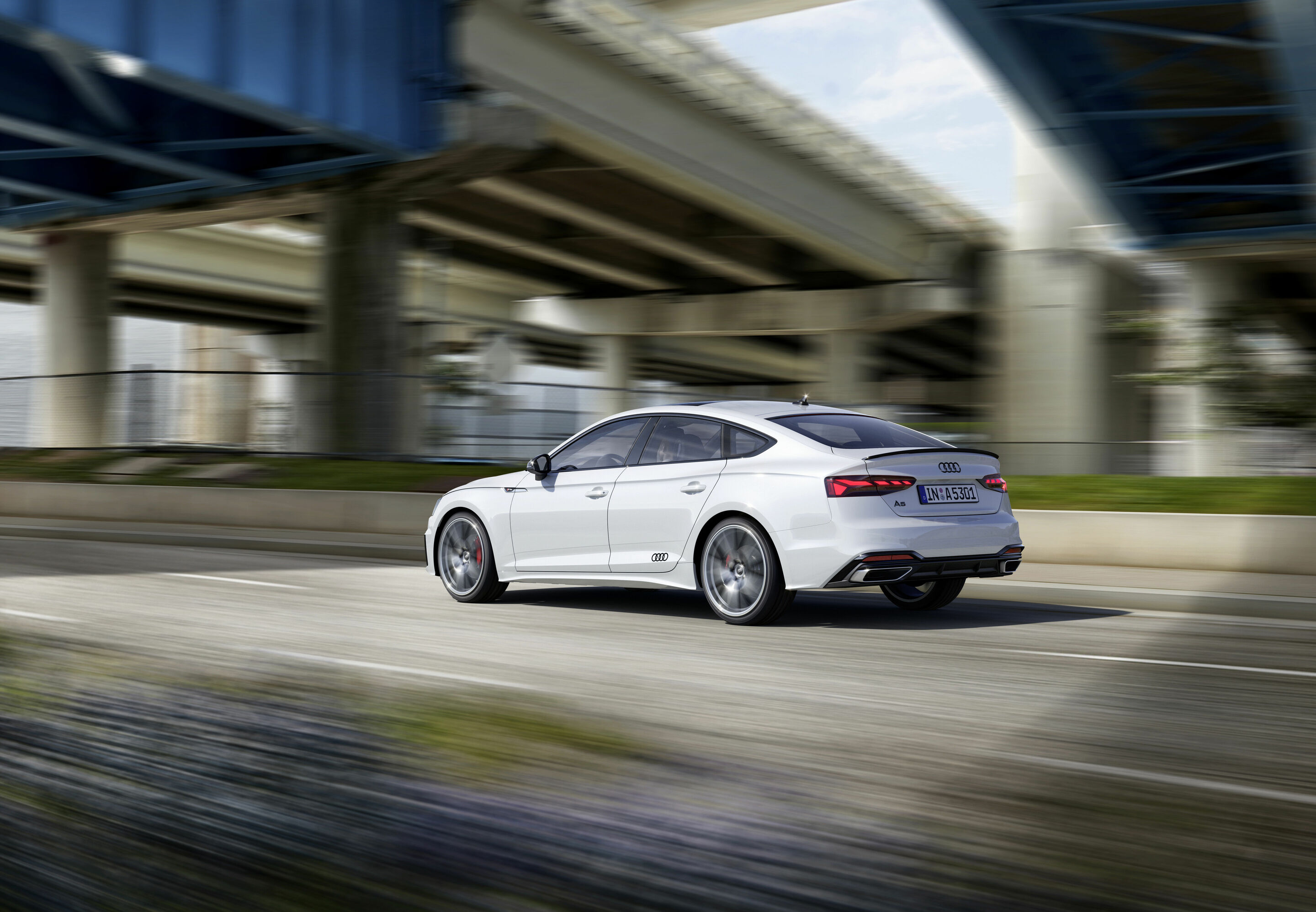 Audi A5 Sportback S line competition plus (2021) - Dynamic photo;
Color: Glacier White Metallic