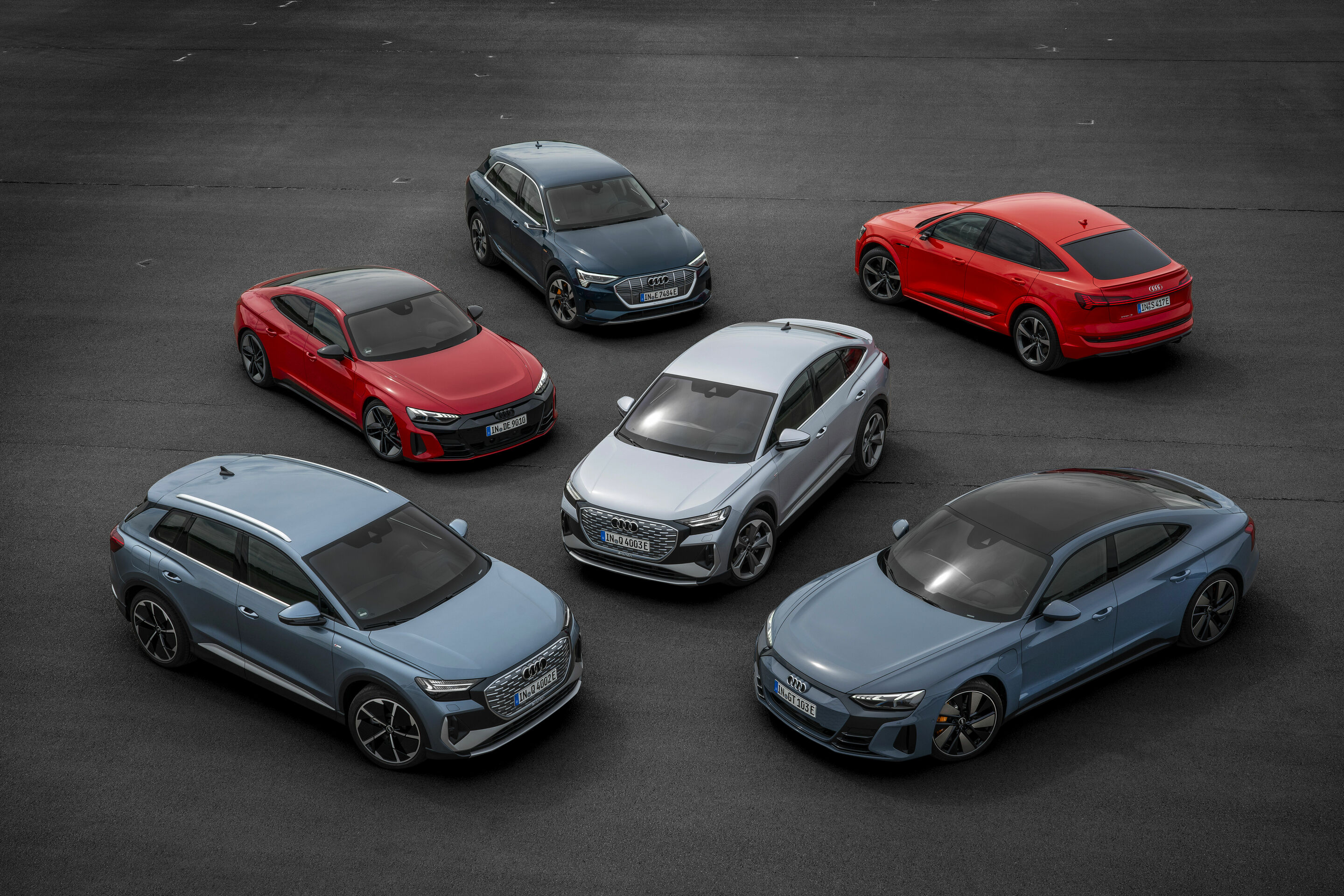 Electrifying test drives - Audi Q4 50 e-tron quattro, Colour: Geyser blue; Audi Q4 Sportback 50 e-tron quattro, Colour: Florett silver; Audi RS e-tron GT, Colour: Tango red; Audi e-tron GT quattro, Colour: Kemora grey; Audi e-tron S Sportback, Colour:...