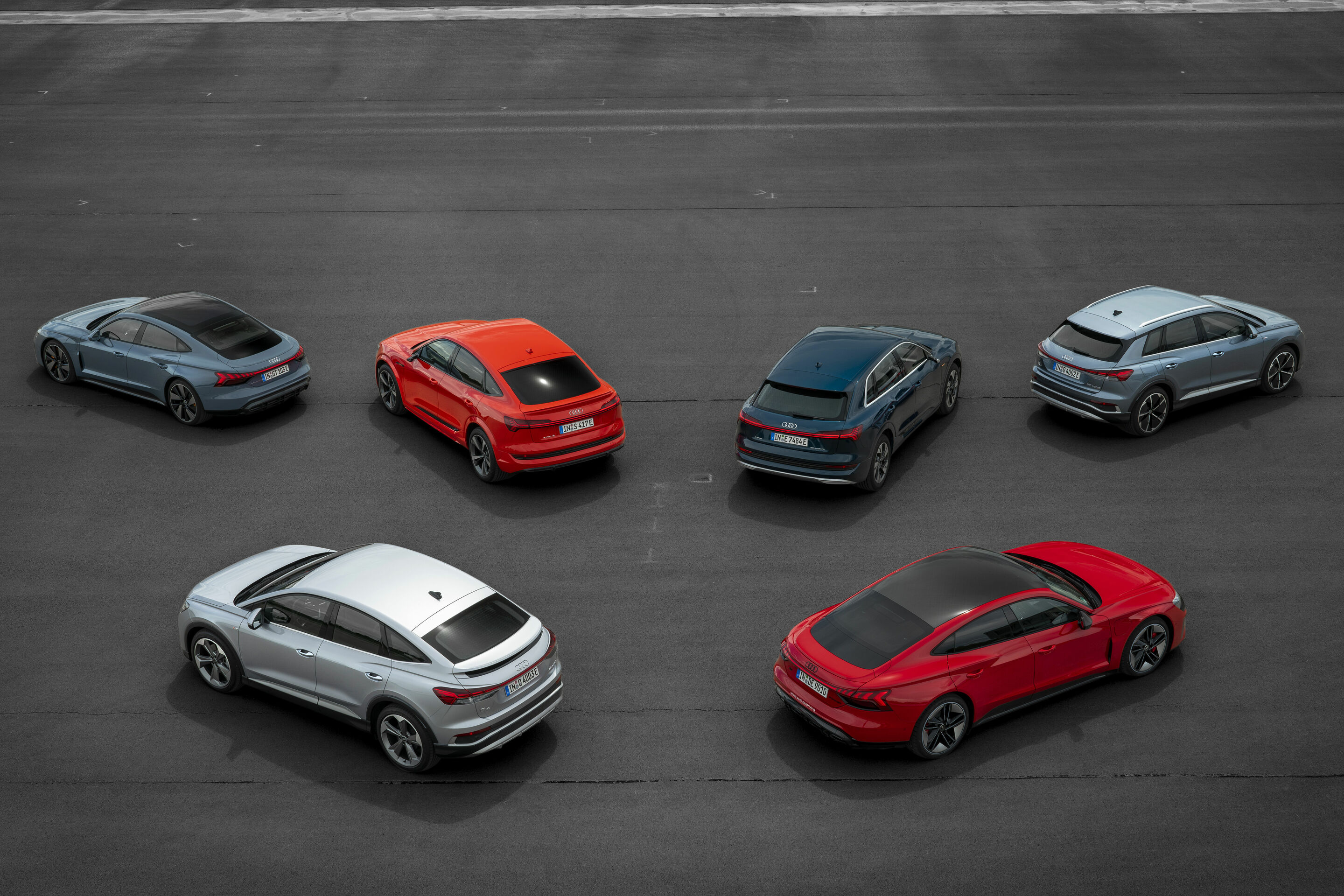 Electrifying test drives - Audi Q4 50 e-tron quattro, Colour: Geyser blue; Audi Q4 Sportback 50 e-tron quattro, Colour: Florett silver; Audi RS e-tron GT, Colour: Tango red; Audi e-tron GT quattro, Colour: Kemora grey; Audi e-tron S Sportback, Colour:...