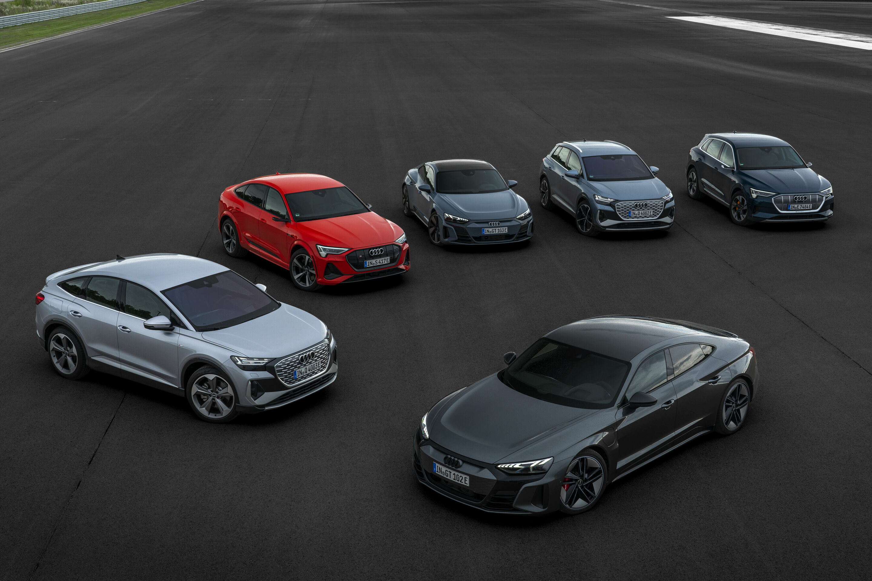 Electrifying test drives - Audi Q4 50 e-tron quattro, Colour: Geyser blue; Audi Q4 Sportback 50 e-tron quattro, Colour: Florett silver; Audi RS e-tron GT, Colour: Daytona grey; Audi e-tron GT quattro, Colour: Kemora grey; Audi e-tron S Sportback, Colour:...