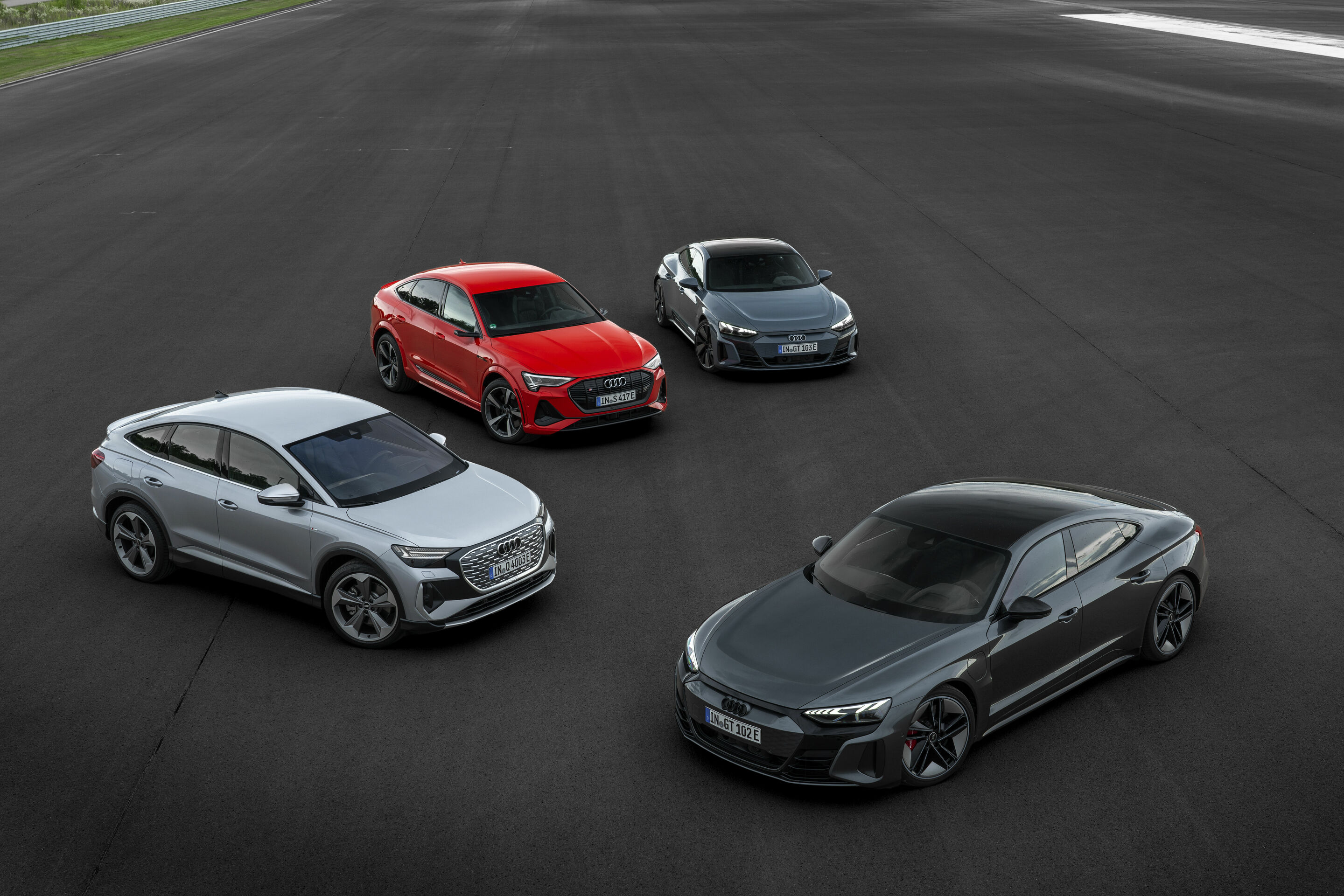 Electrifying test drives - Audi Q4 50 e-tron quattro, Colour: Geyser blue; Audi Q4 Sportback 50 e-tron quattro, Colour: Florett silver; Audi RS e-tron GT, Colour: Daytona grey; Audi e-tron GT quattro, Colour: Kemora grey; Audi e-tron S Sportback, Colour:...
