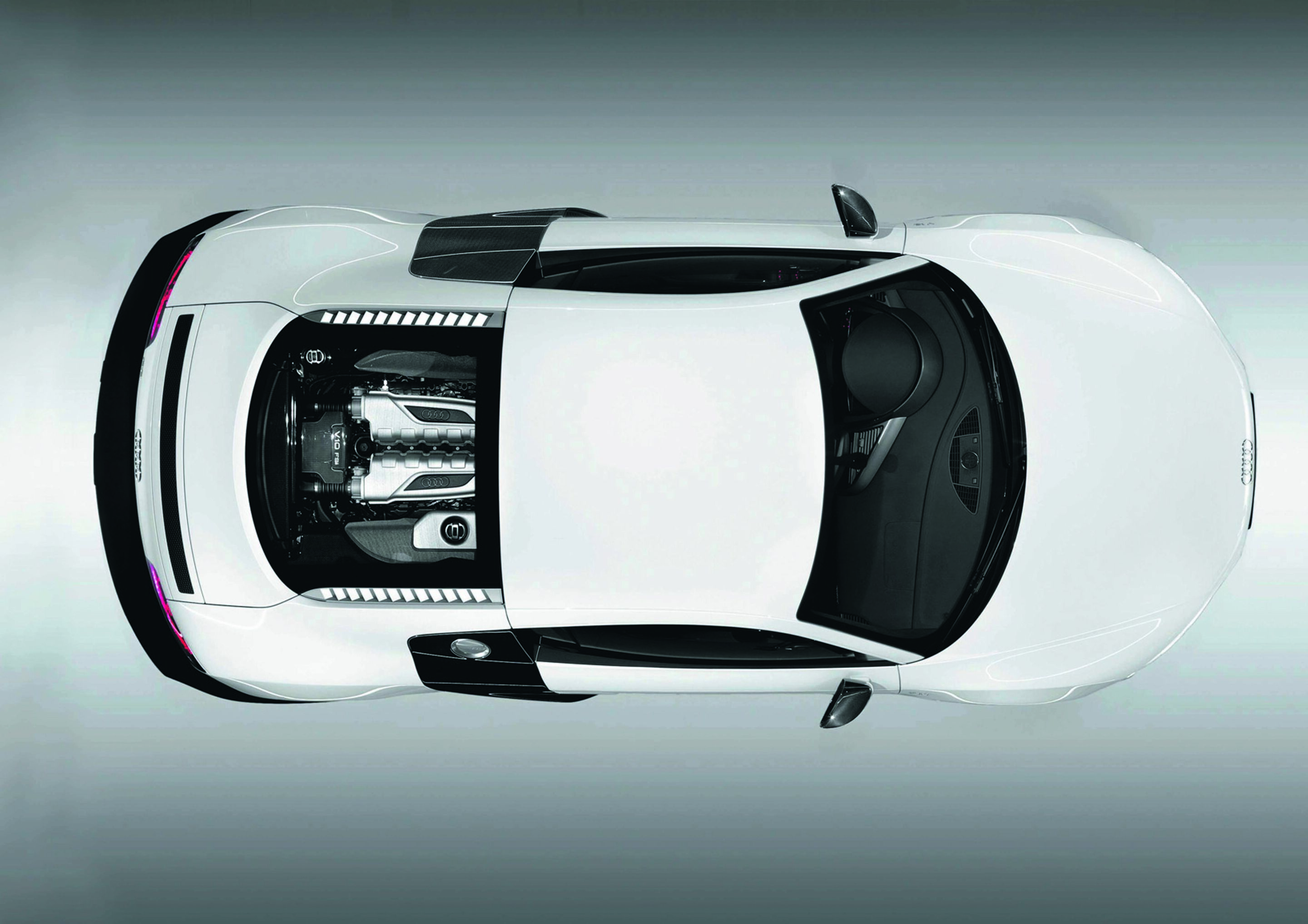 Anniversary magazine Design - Audi R8 - the engine is presented beneath the glass screen, as if on stage.