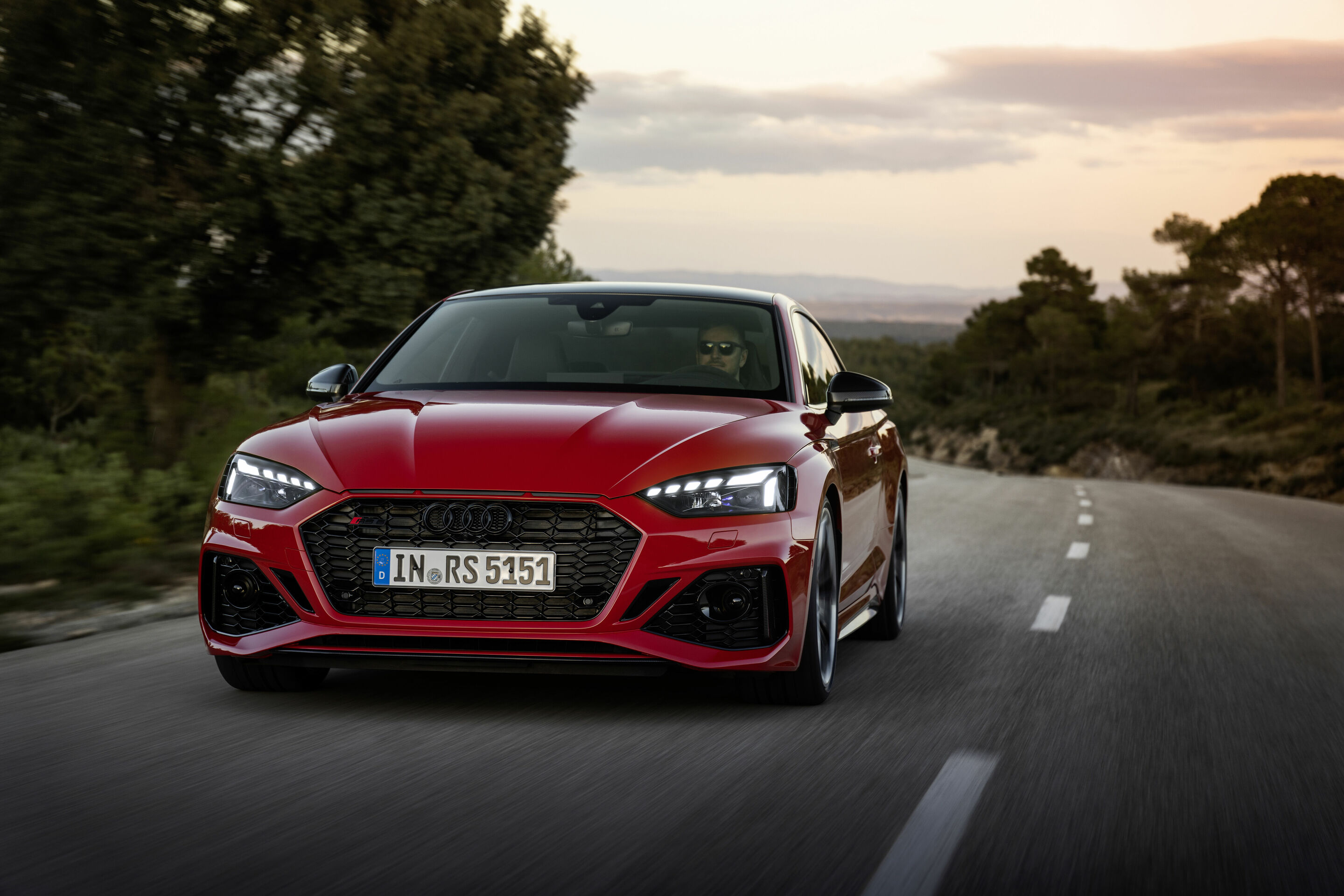 Audi RS 5 Coupé with competition plus package - Dynamic photo, Colour: Tango red