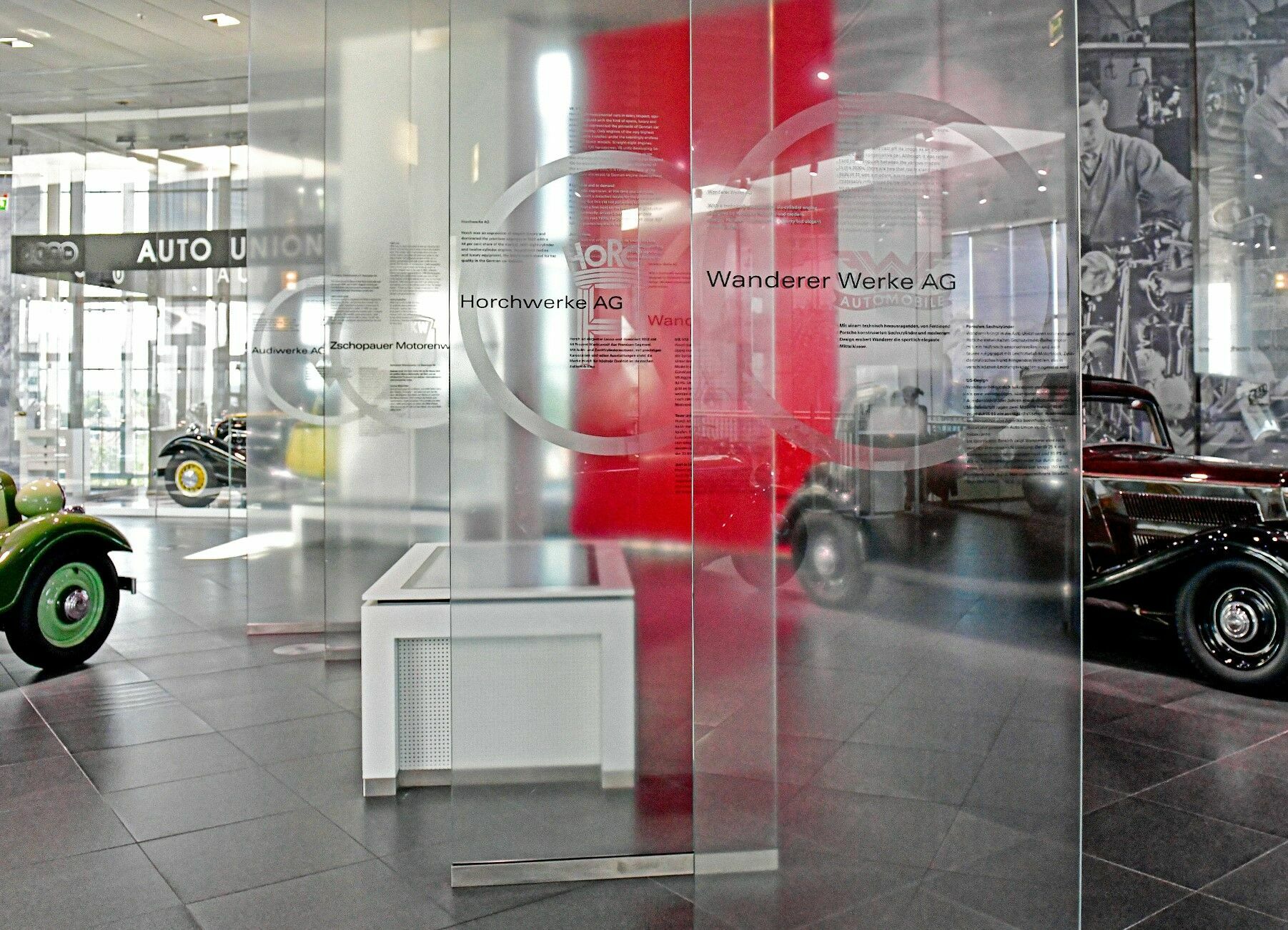 So werden die Vier Ringe zum Audi-Markenzeichen: Auto Union AG vor 90 Jahren gegründet - Im Audi museum mobile in Ingolstadt können die Besuchenden in die Geschichte der Vier Ringe eintauchen – hier gibt es einen speziellen Bereich zur Gründung der Auto...