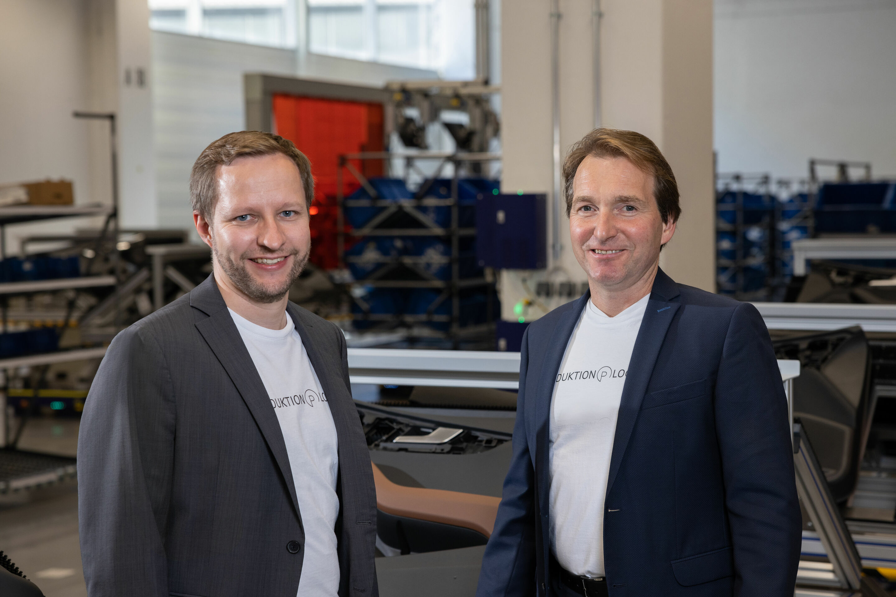 Smart Production - Dr. Ing. Wolfgang Kern (Project Lead “Modular Production” within Audi Production Lab) and Dr. Josef Weinzierl (Head of Manufacturing Engineering Assembly SSP/MQB/PPE/HV Batteries) drive the modular assembly at Audi.