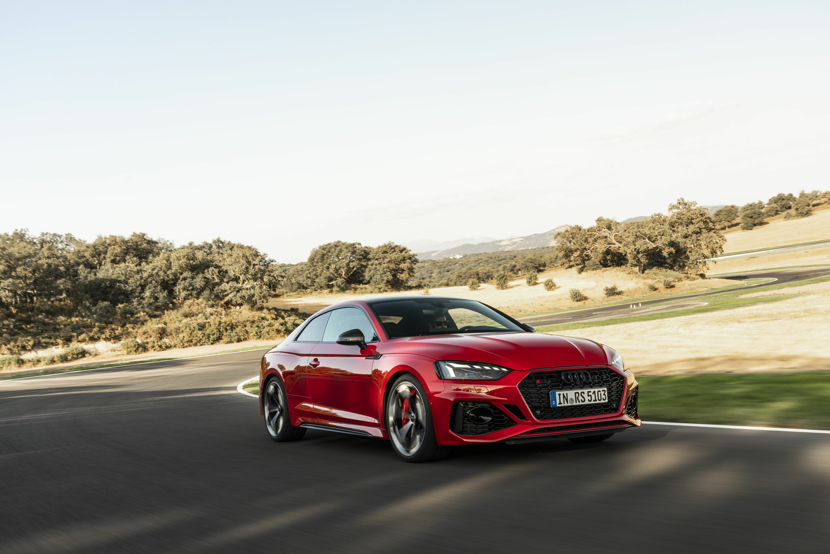 Audi RS 5 Coupé with competition plus package - Dynamic photo,
Colour: Tango red