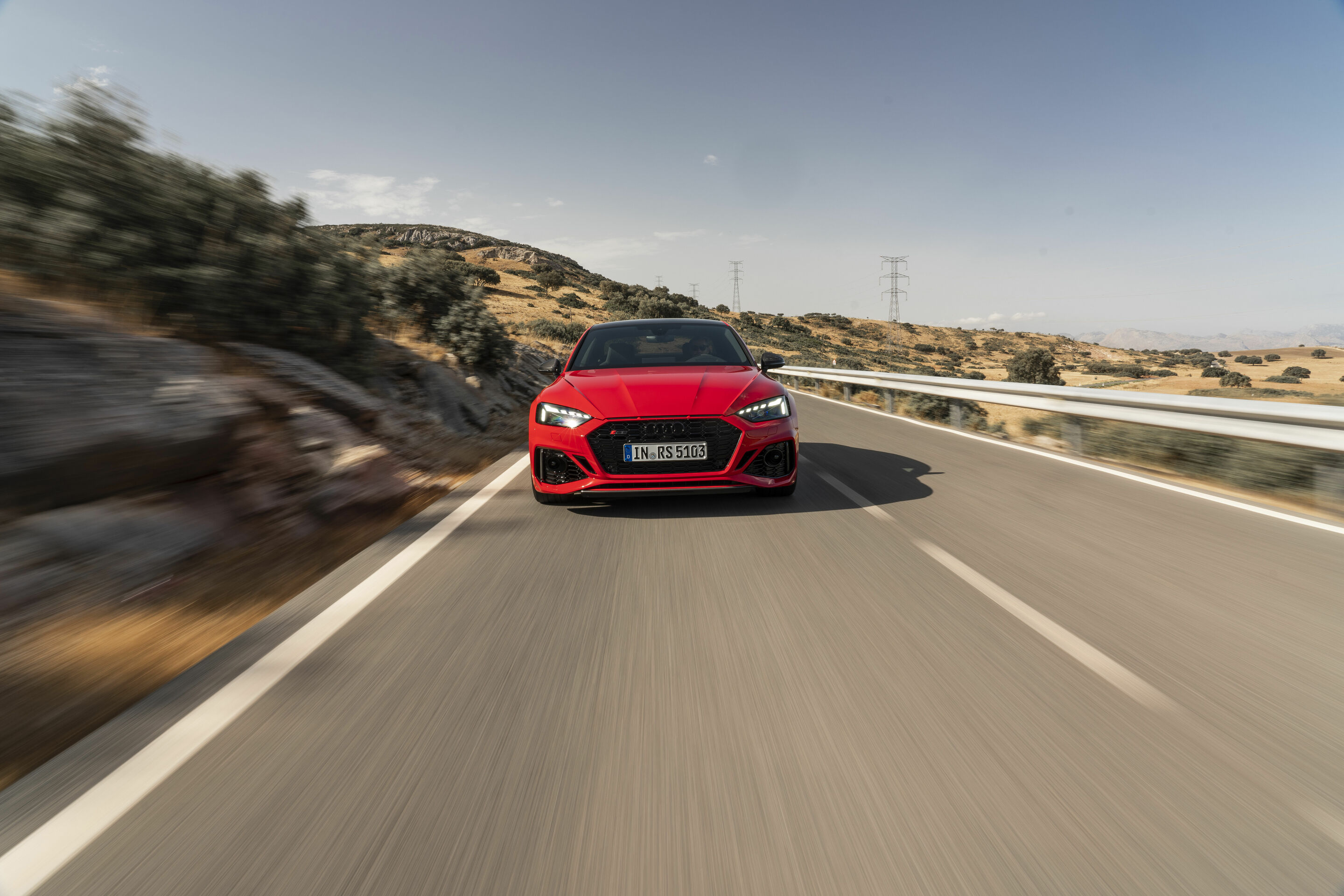Audi RS 5 Coupé with competition plus package - Dynamic photo,
Colour: Tango red