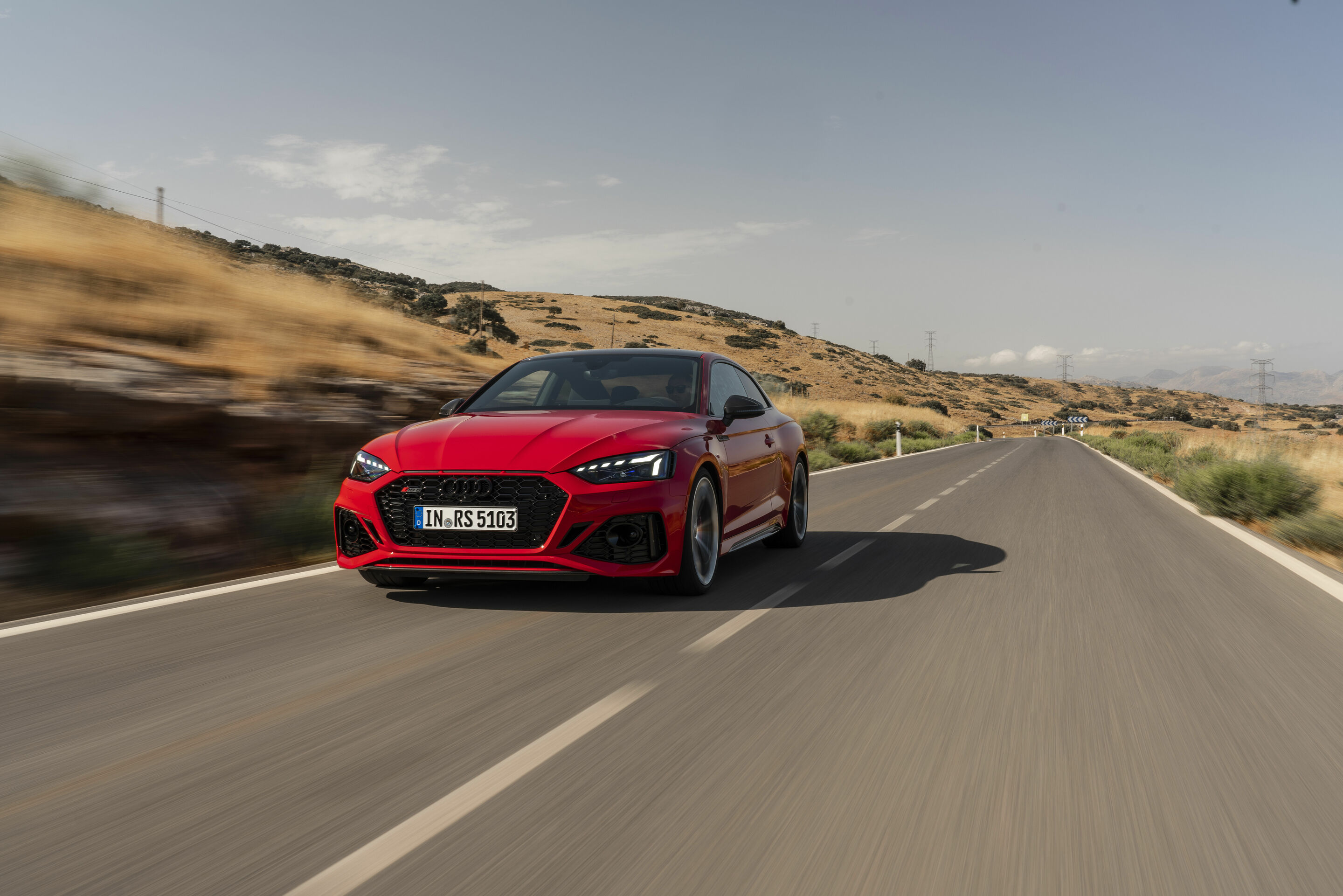Audi RS 5 Coupé with competition plus package - Dynamic photo,
Colour: Tango red