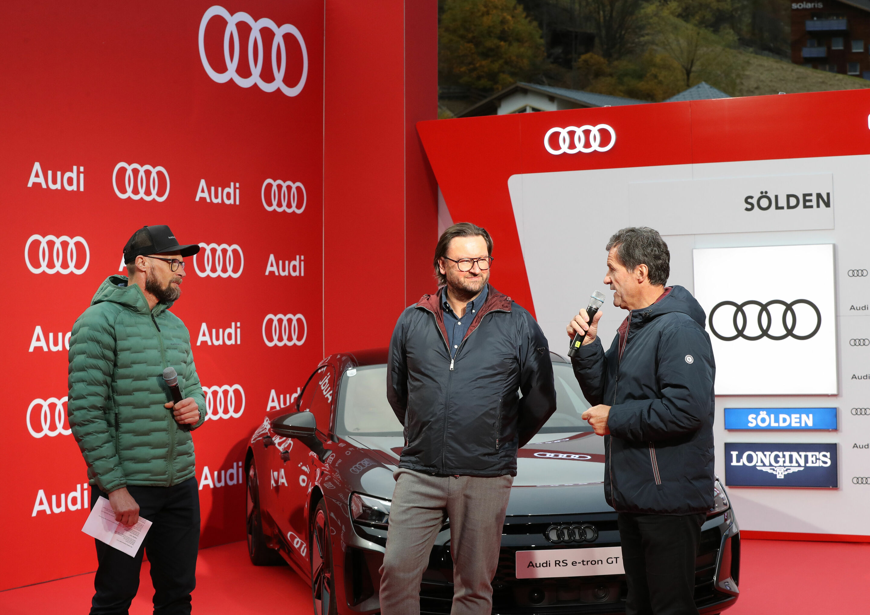 Partnership with FIS extended: Audi to shape Alpine Ski World Cup for four more years - ZDF commentator Marco Büchel, Bernhard Neumann, Director Sports Marketing Wintersport at Audi, and Michel Vion, General Secretary of the FIS during the Audi presentation...