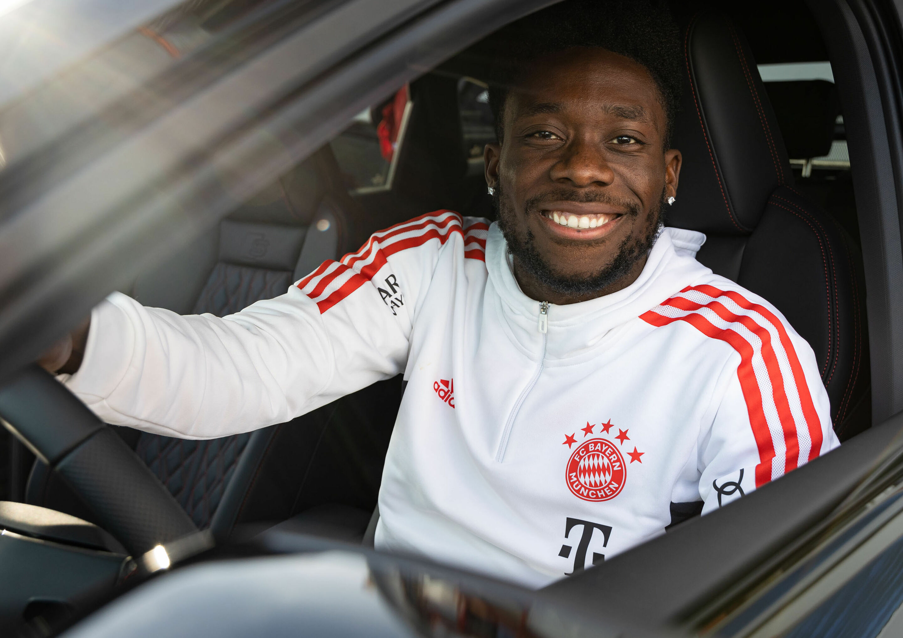 Audi vehicle handover - FC Bayern’s Alphonso Davies during the vehicle handover at Säbener Straße