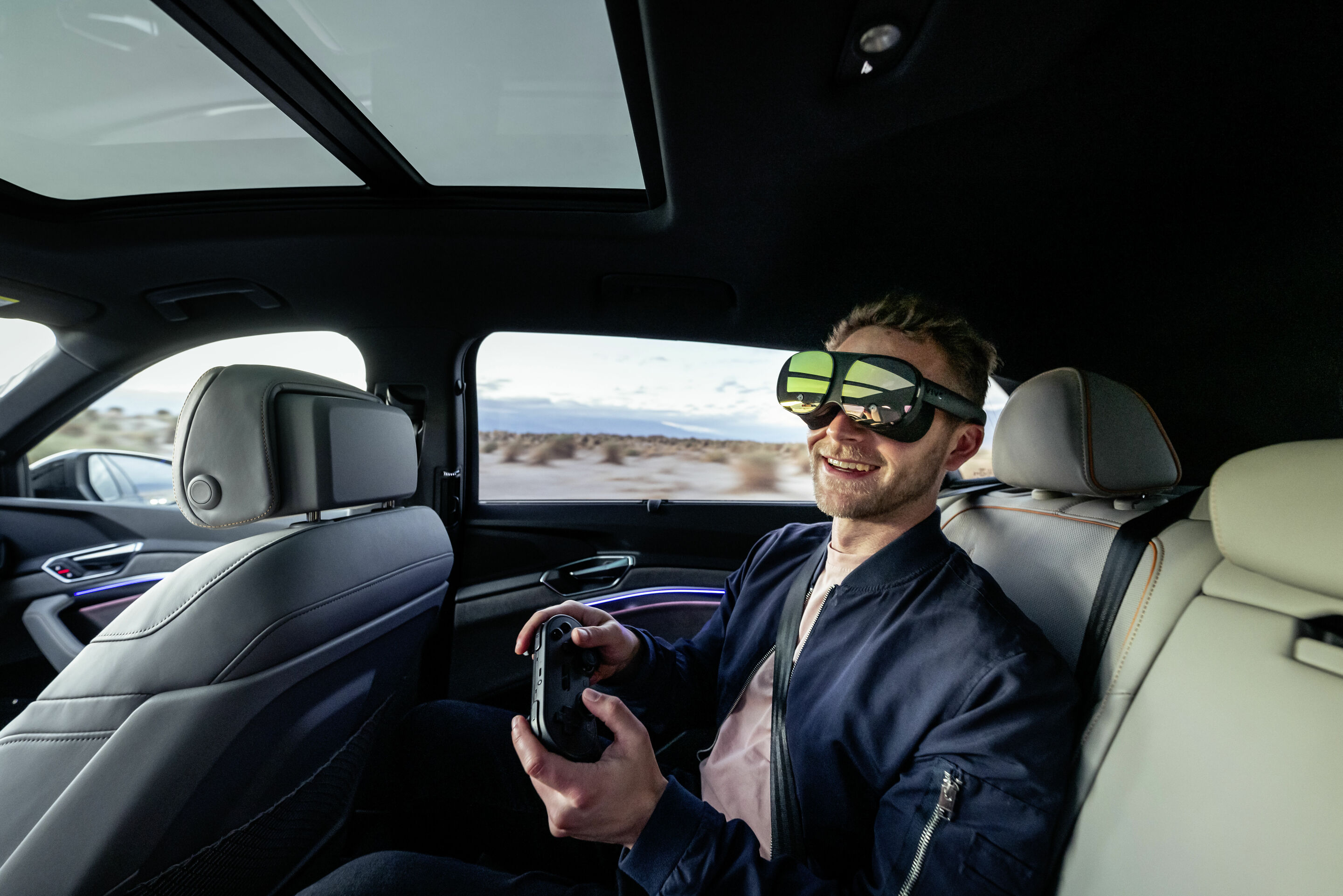 Audi at CES 2023: Test drives with holoride - Audi at CES 2023: Test drives with holoride

Using virtual-reality glasses during a drive: Only permitted for passengers in the second row of seats in the side positions.is permitted for people over 1.5 meters...