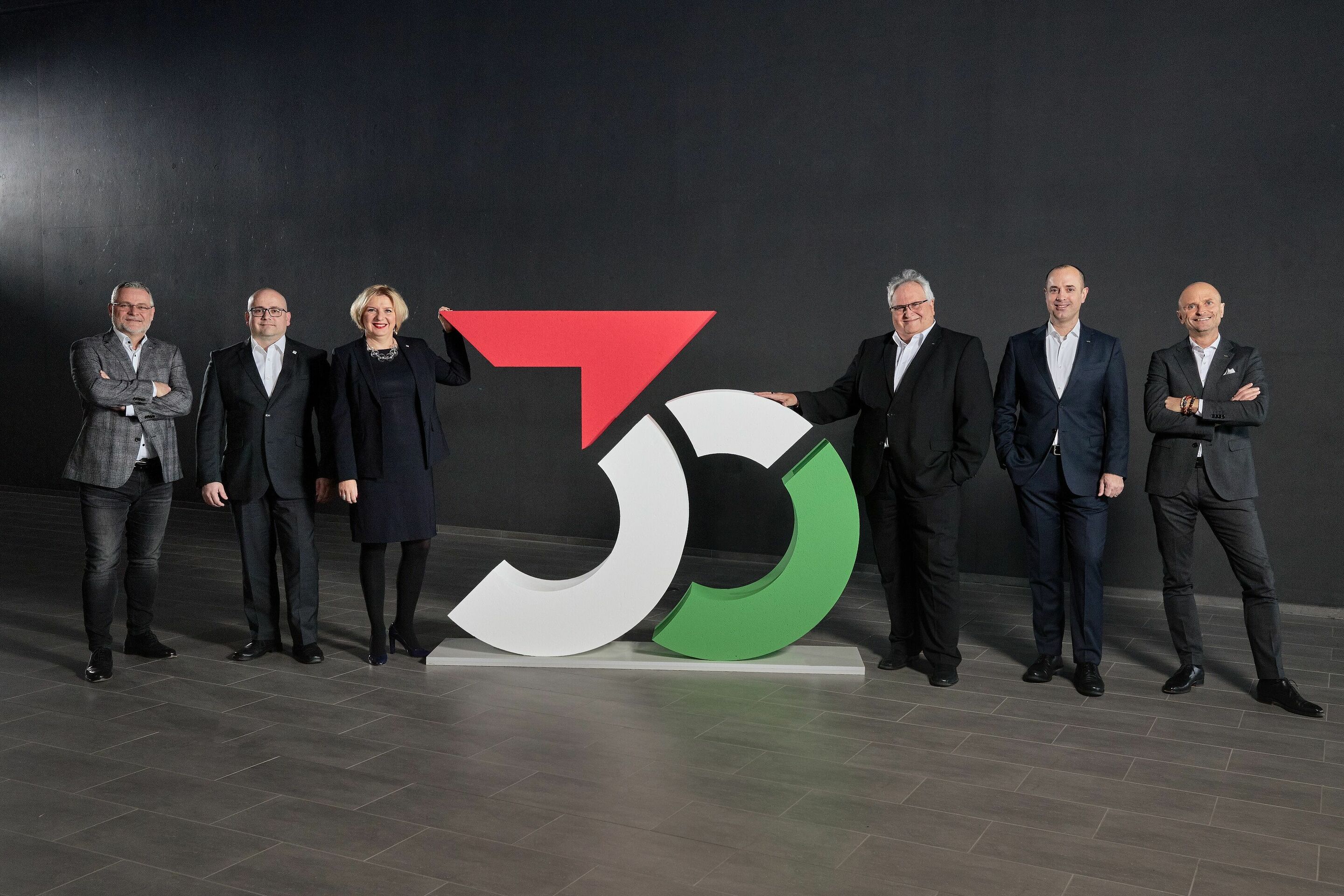 Audi Hungaria celebrates 30 years of success - From left to right: Robert Buttenhauser, Member of the Board of Management Production Powertrain, György Nagy, Chairman of the Work Council of Audi Hungaria, Kinga Németh, Member of the Board of Management...