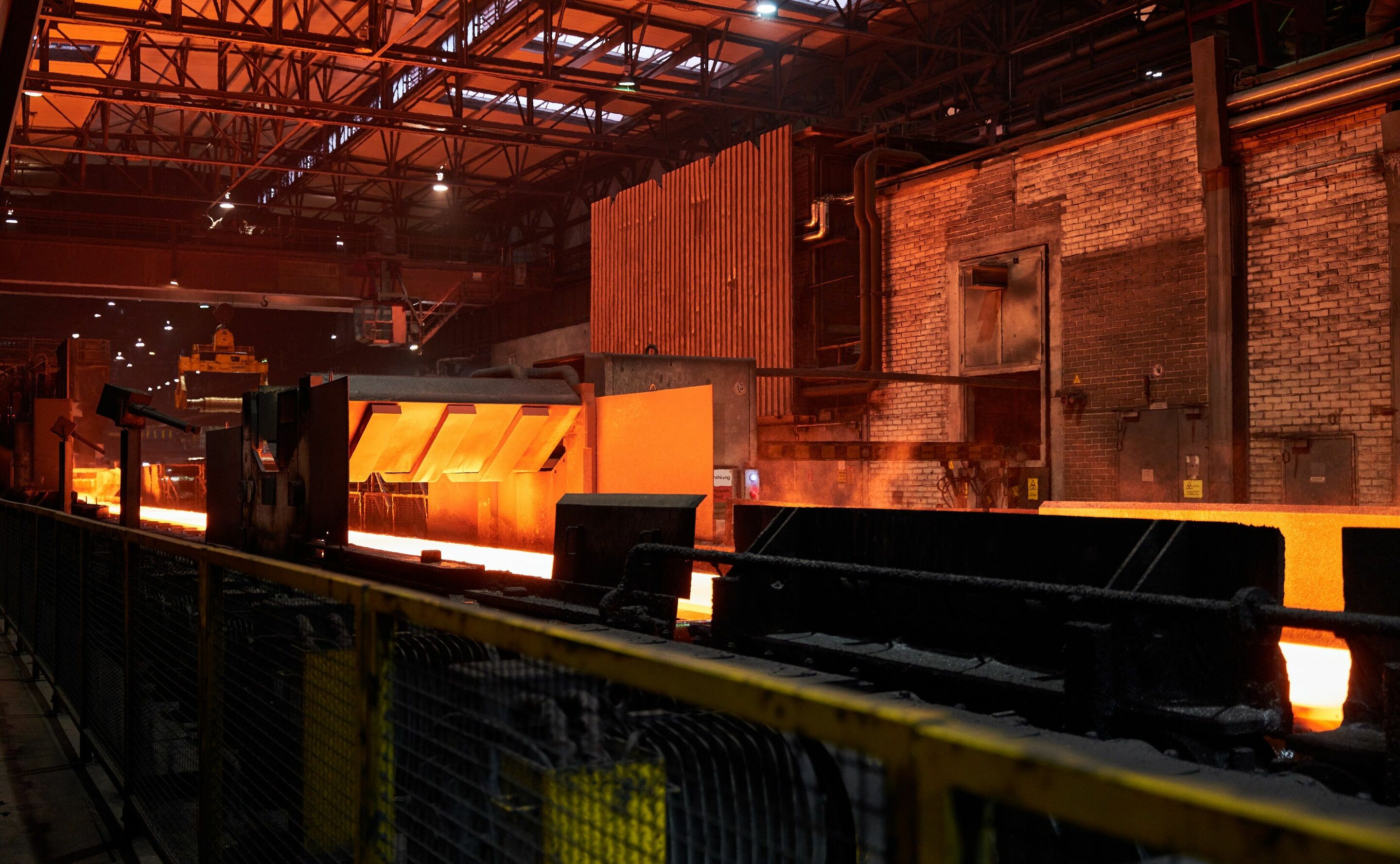 MaterialLoop project tests circular economy potential of end-of-life vehicles - Much of the project’s recycled steel can be used to produce new models. Seen here: On a hot strip mill, a 12-meter-long (40 ft) solid steel ingot is rolled for the first time,...