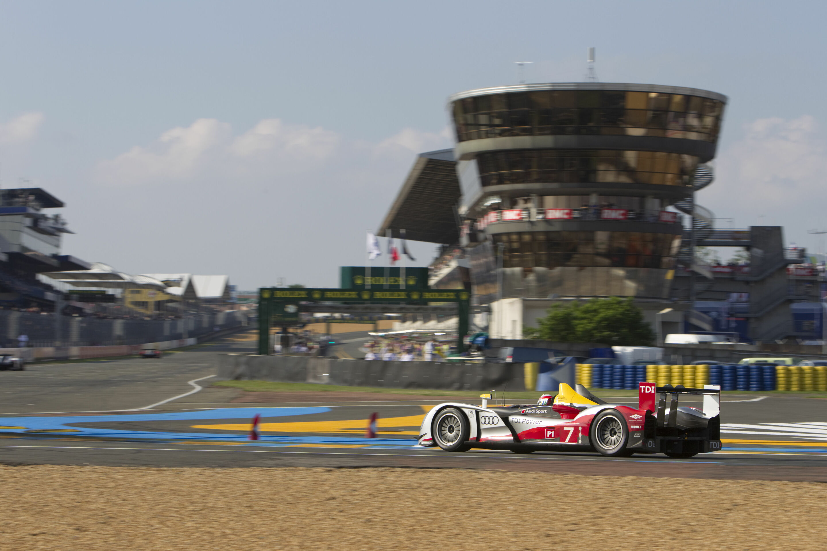 New book from Audi Tradition: “Audi at Le Mans” - Tom Kristensen turns onto the start-finish straight of the 2010 Le Mans 24 Hours in the number 7 Audi R15 TDI. He finishes third with Dindo Capello and Allan McNish behind two sister cars. From the book...