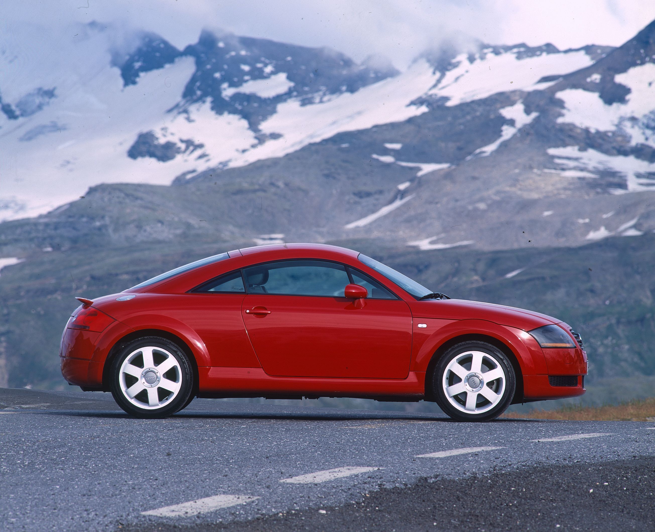 A timeless design icon: The Audi TT turns 25 (until 2023) - The first-generation Audi TT Coupé (photographed in the mountains).