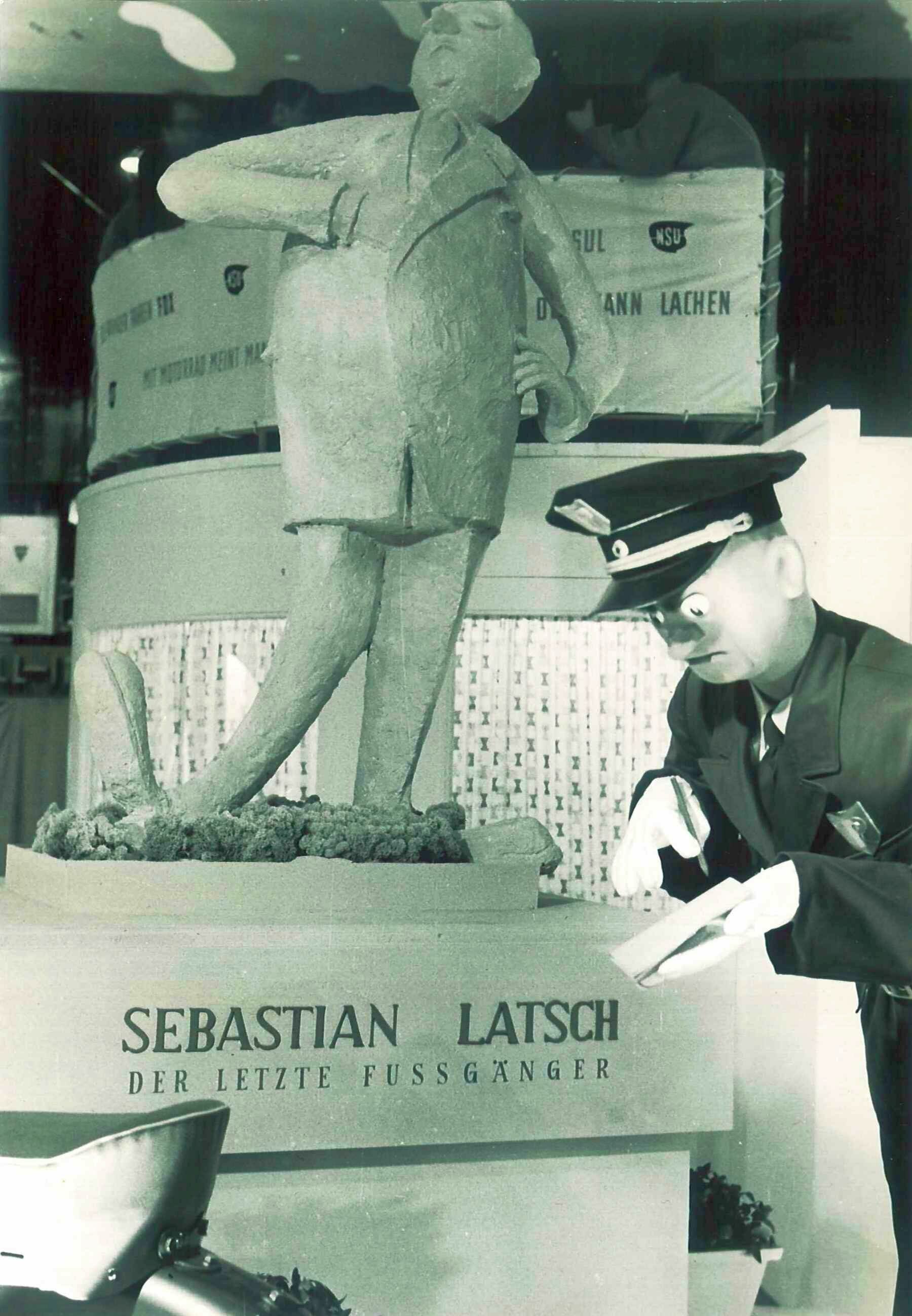 “Nicht mehr laufen, Quickly kaufen”: the NSU Quickly - At the NSU pavilion at the IFMA (International Bicycle and Motorcycle Exhibition) in Frankfurt am Main in October 1953, a cardboard figure stands next to the new NSU Quickly, reading: “Sebastian Latsch,...