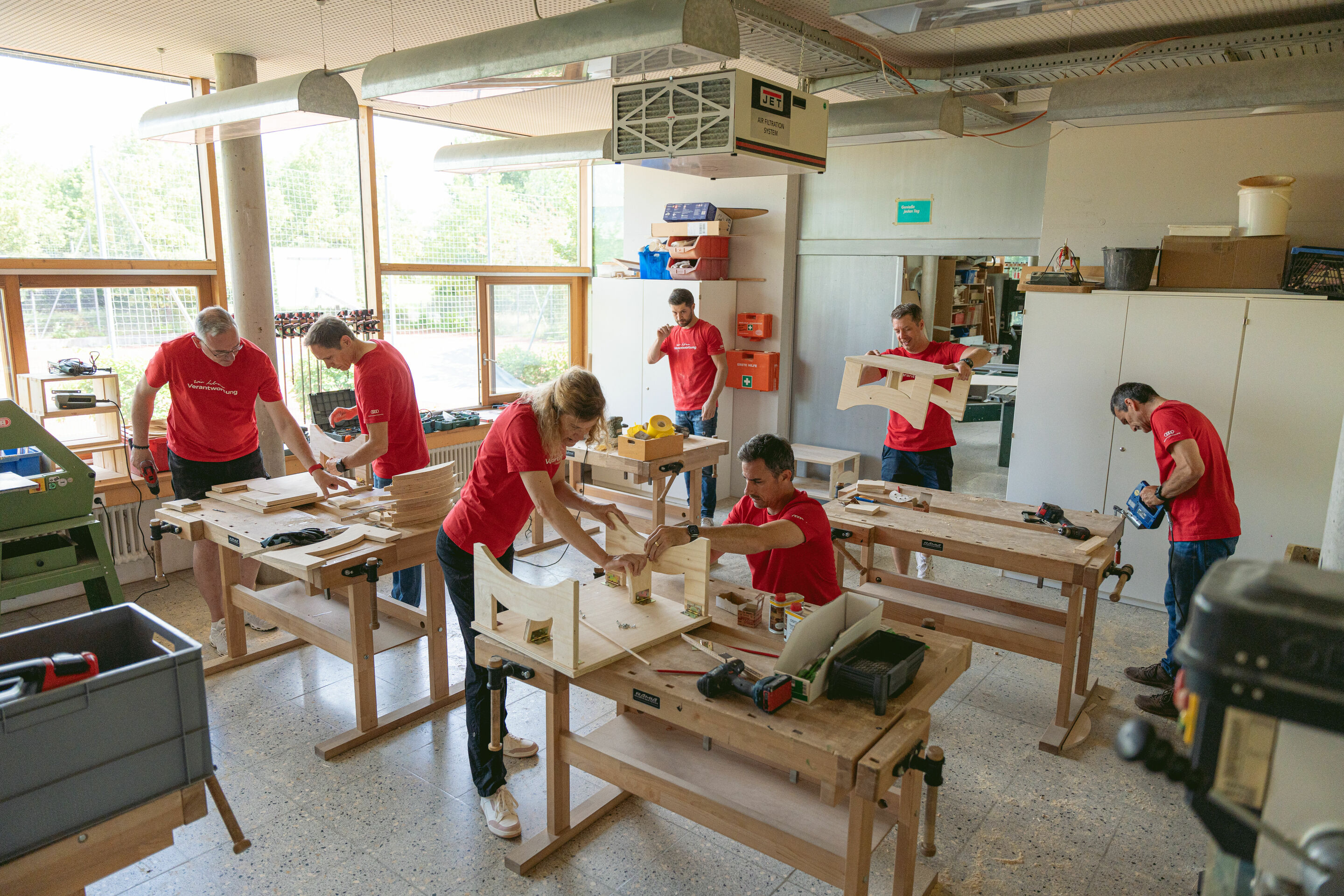 Audi Social Day - On June 24, 2023, Audi employees are teaming up with multiple organizations to champion social causes. Pictured: Project "Building folding tables for the Hollerstauden nursery", Ingolstadt, including Audi Board Member for Production...
