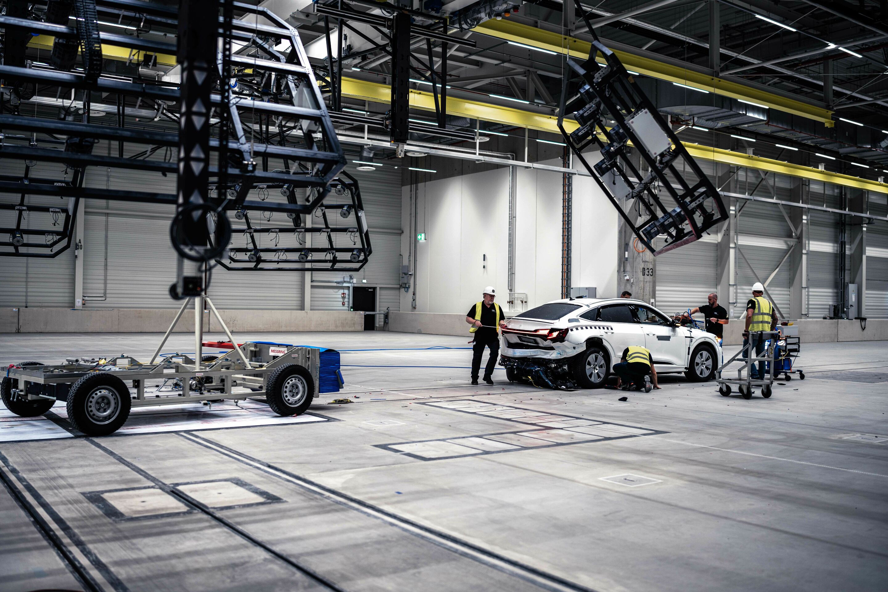 Audi opens new Vehicle Safety Center - Fast rear-end crash: The mobile deformable barrier hits the vehicle at 80 km/h.