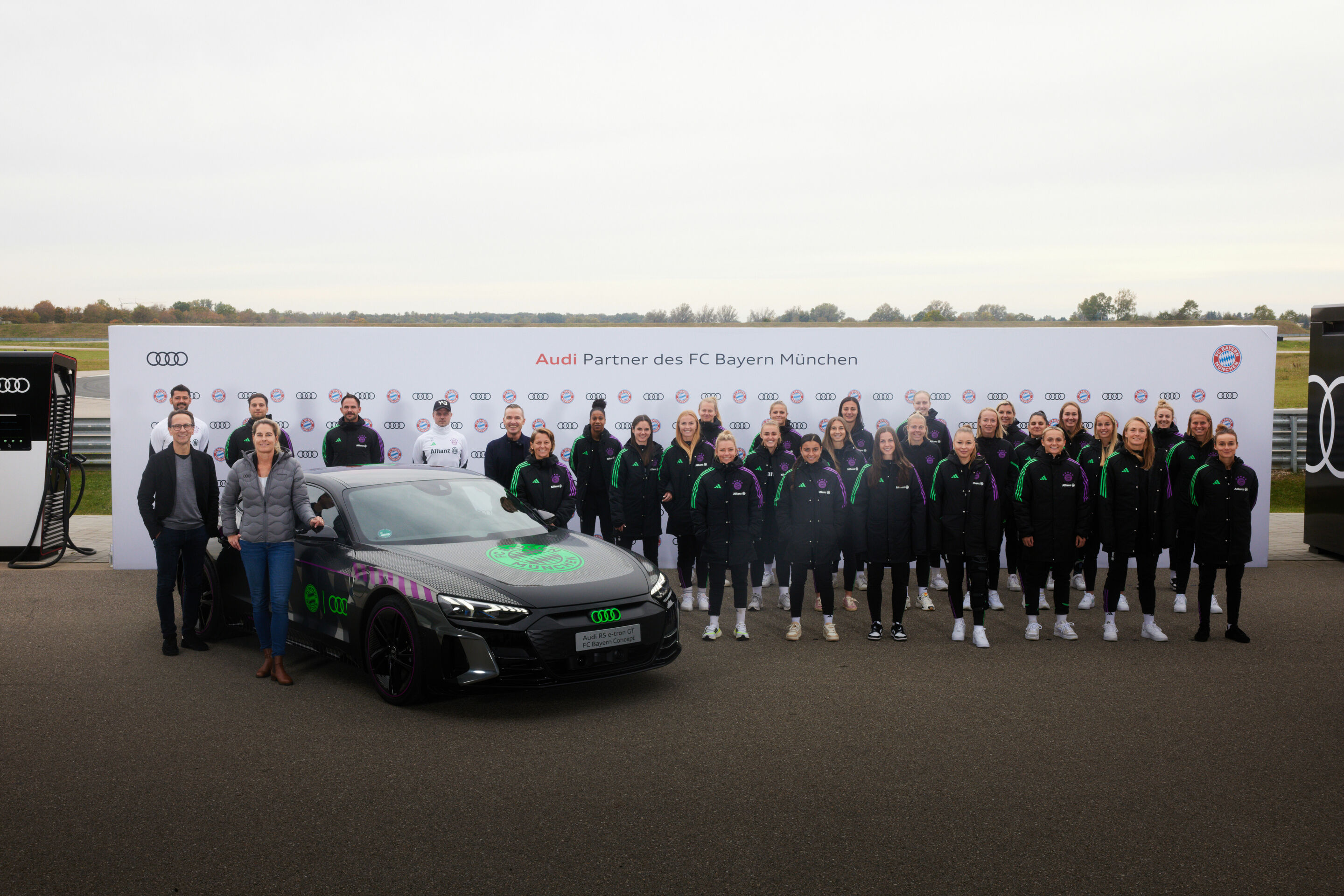 Audi vehicle handover to the FC Bayern Munich women's team - The female soccer players and coaches of FC Bayern München together with Christian Schüller, Head of Sport Marketing Soccer and Sandra Göres, Head of Audi driving experience.
