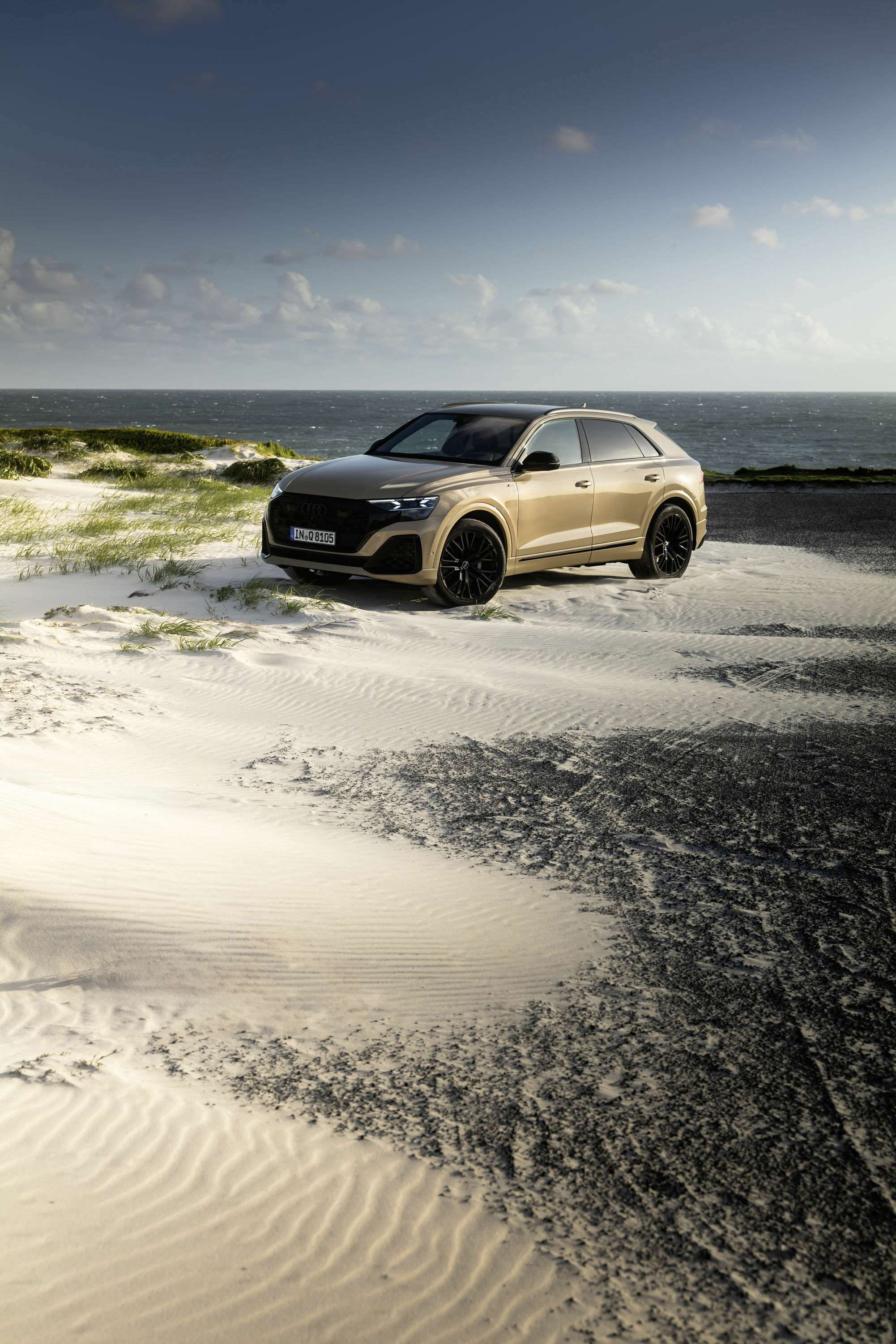Audi Q8 - Standaufnahme,
Farbe: Sakhirgold Metallic