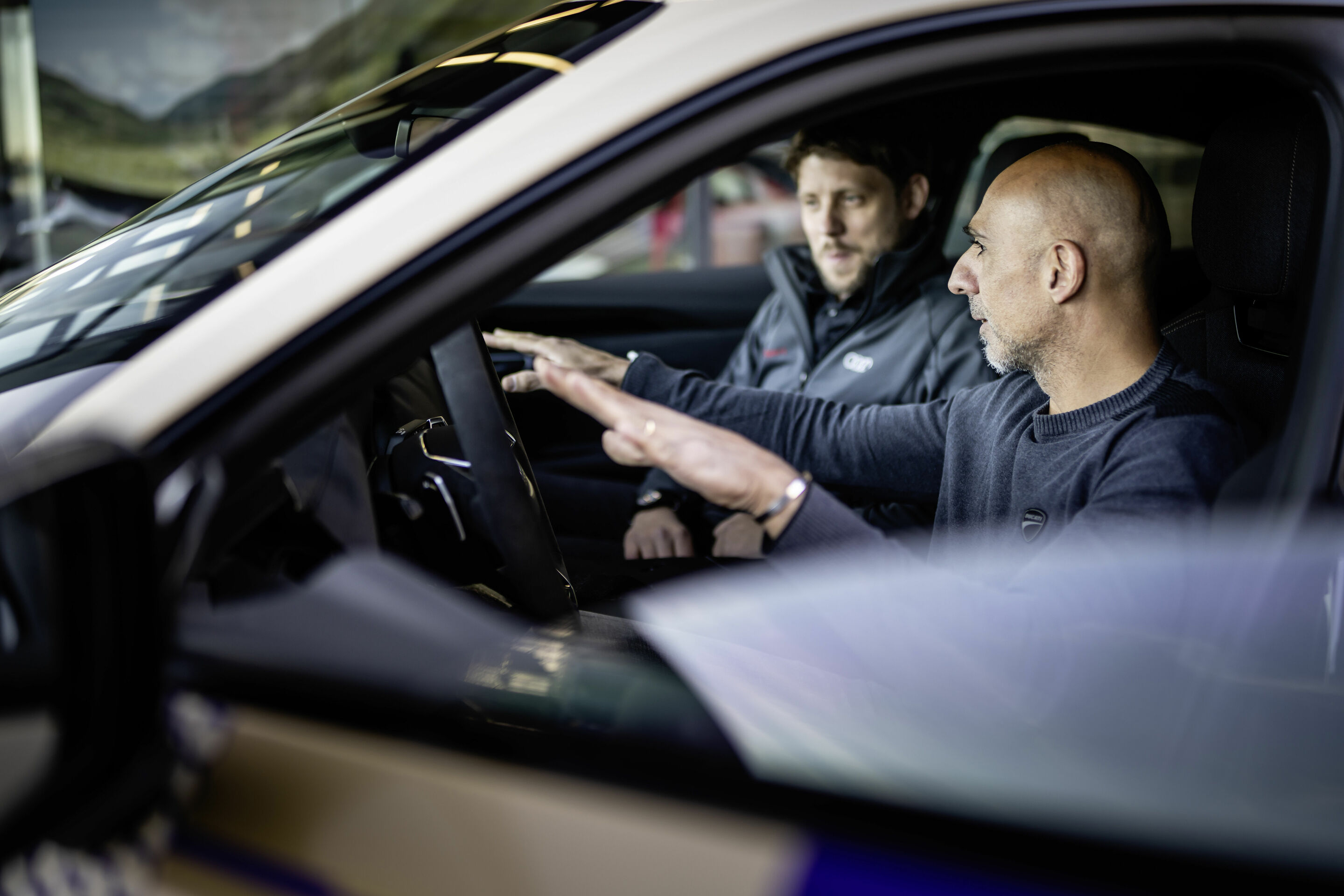 Audi e-tron GT prototype - Ducati Chief Tester Alessandro Valia (front) is enthusiastic about the e-tron GT prototype after a test ride with Jaan Mattes Reiling.
