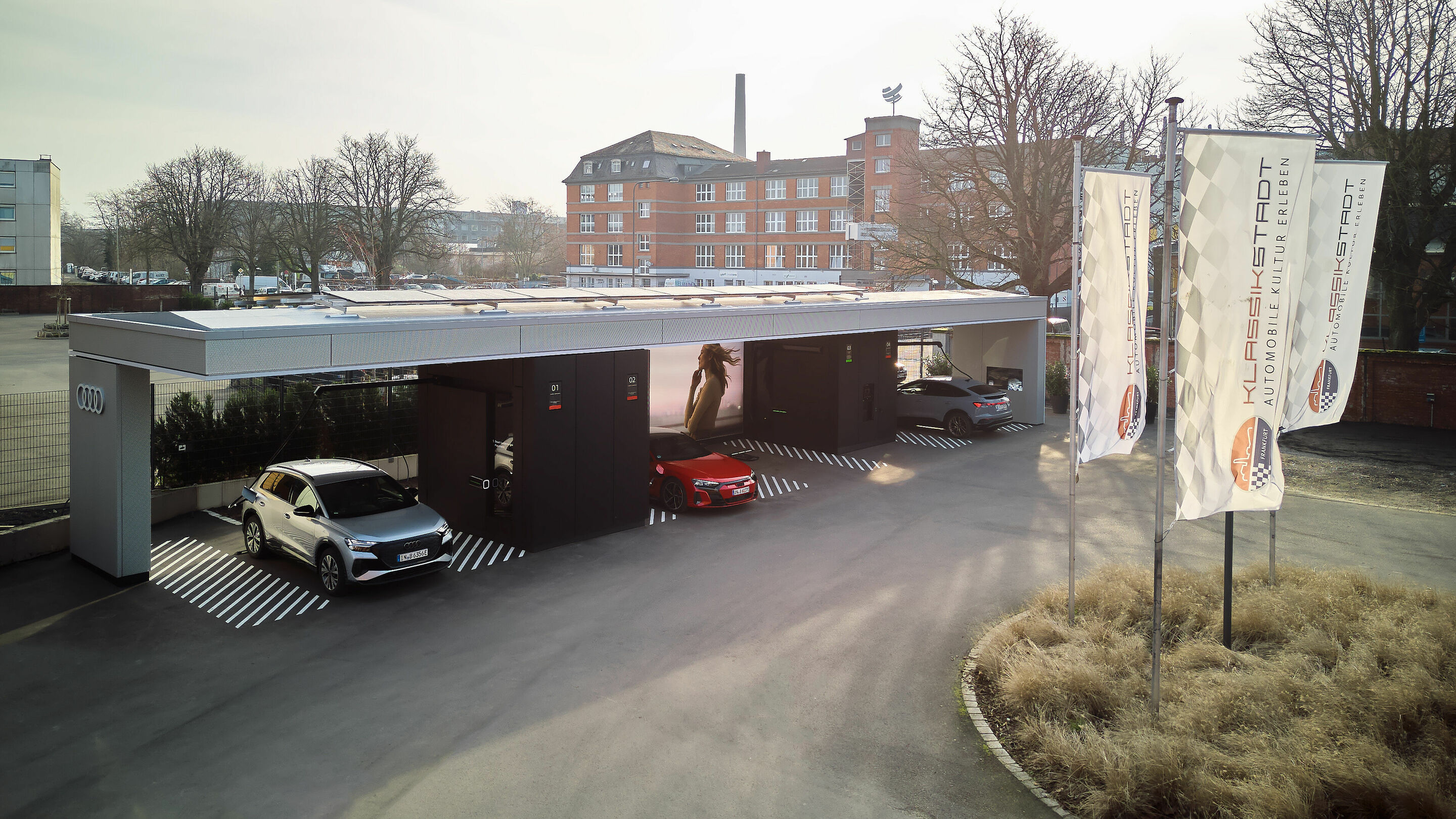 Audi charging hub Frankfurt - State-of-the-art charging technology without barriers and automotive history in harmony: the new Audi charging hub at Klassikstadt Frankfurt.