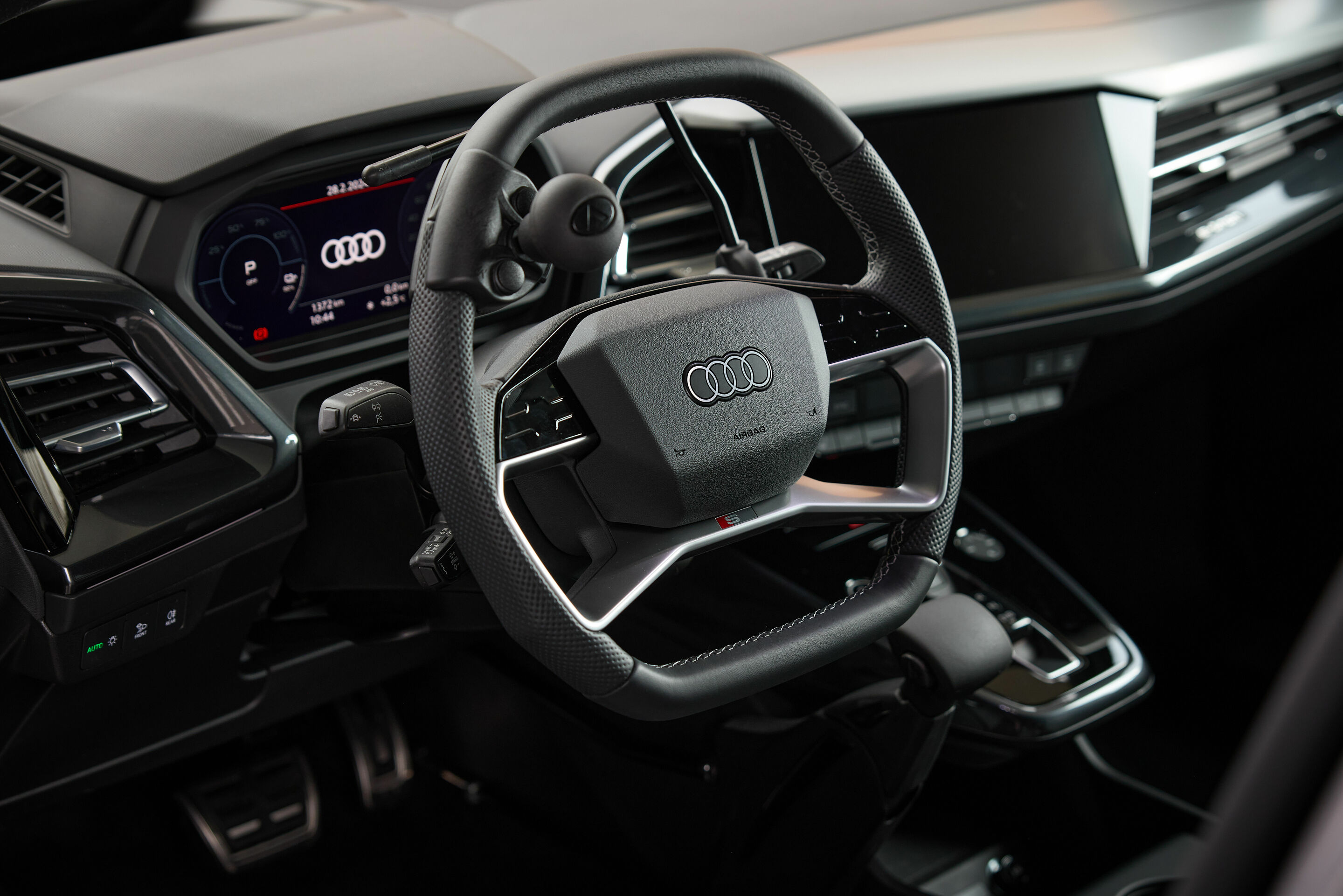 Audi charging hub Frankfurt - For people with mobility requirements, the Q4 e-tron series is available with driving aids fitted at the factory. In 2007, Audi became the first automaker to put driving aids in their configurator. In this picture: A compact...