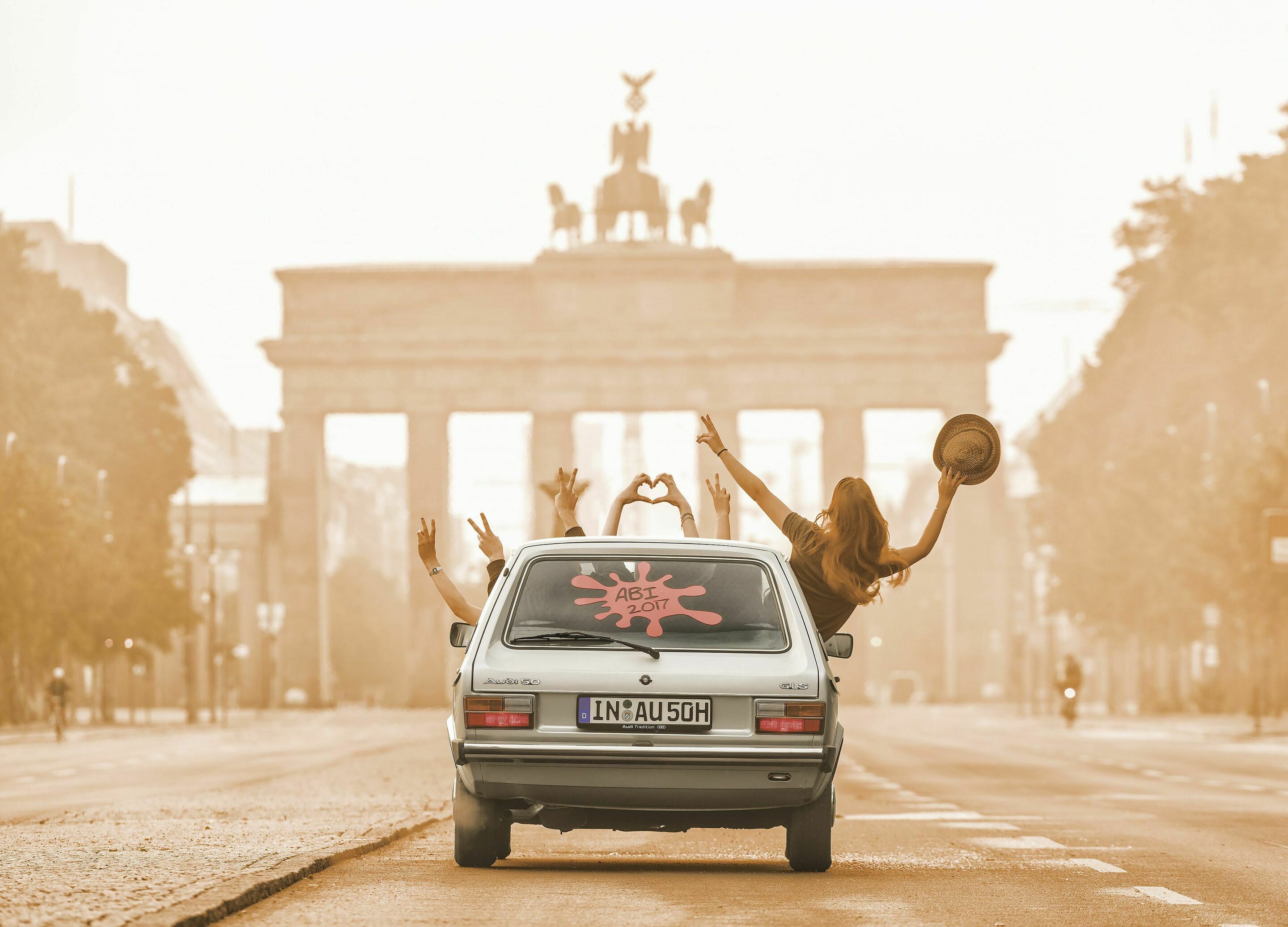 Germany’s first small car was launched 50 years ago - An Audi 50 from Audi’s historical vehicle collection – shown in front of the Brandenburg Gate in Berlin.