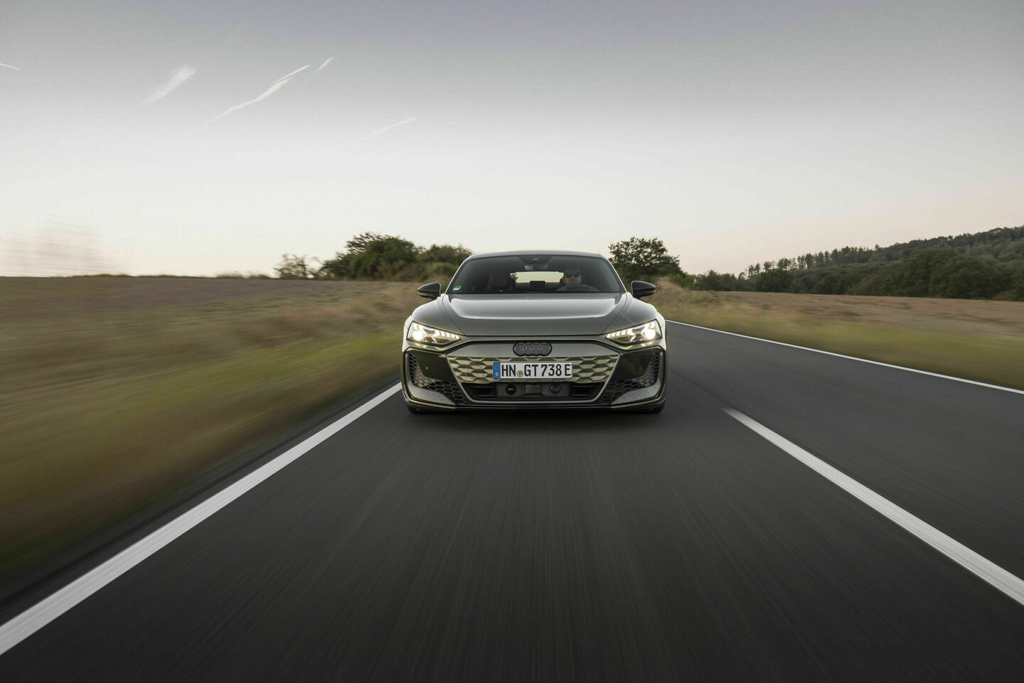 Audi RS e-tron GT performance, Dynamic photo,
color: Oak green metallic, customized paint finish, Audi exclusive