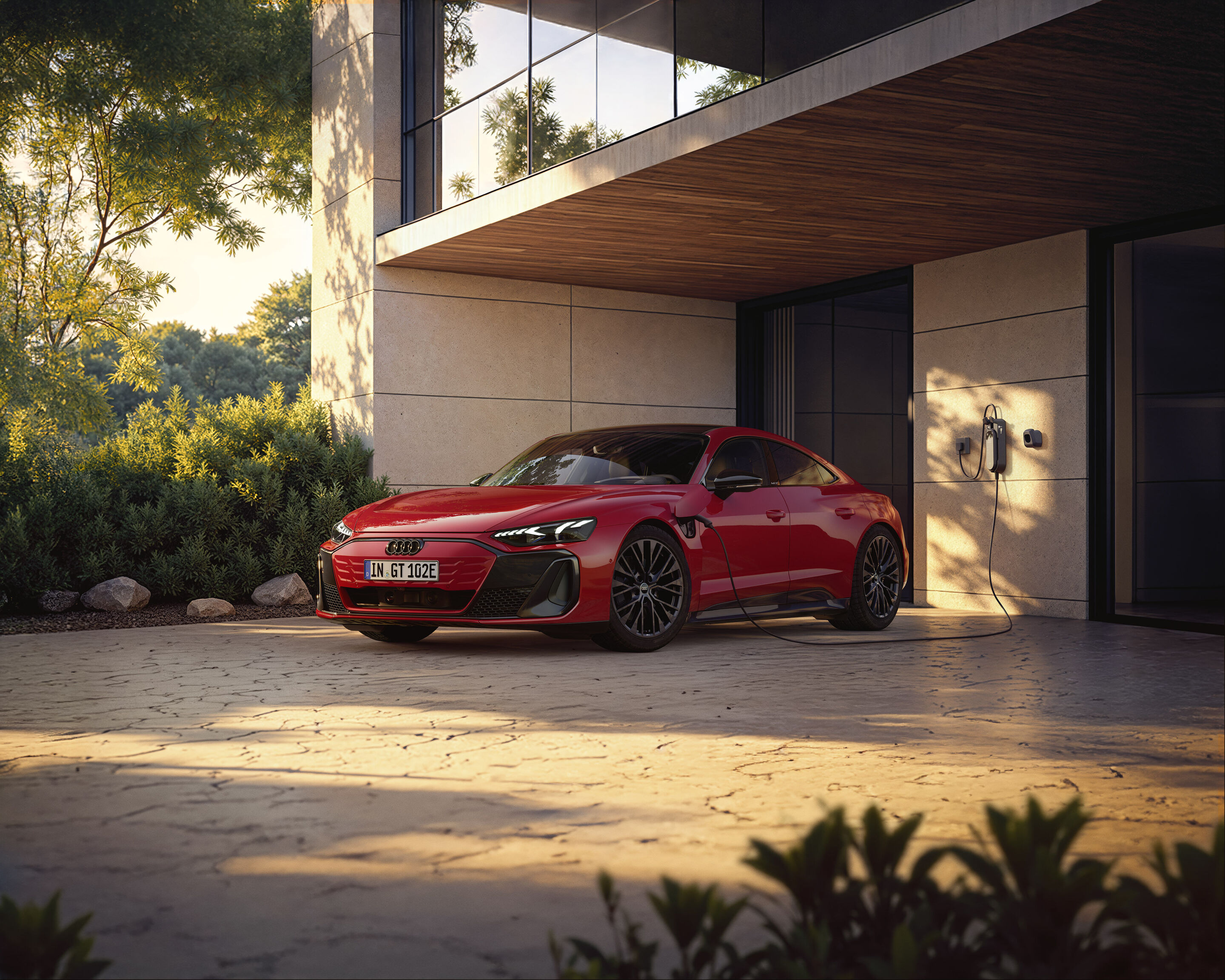 Einstieg in die Spitzenklasse: Audi e-tron GT quattro vereint emotionales Design, Performance und Komfort - Der Audi e-tron GT quattro kombiniert dynamisches Fahren mit einer hohen Alltagstauglichkeit. Der gezeigte Hintergrund ist KI-generiert.