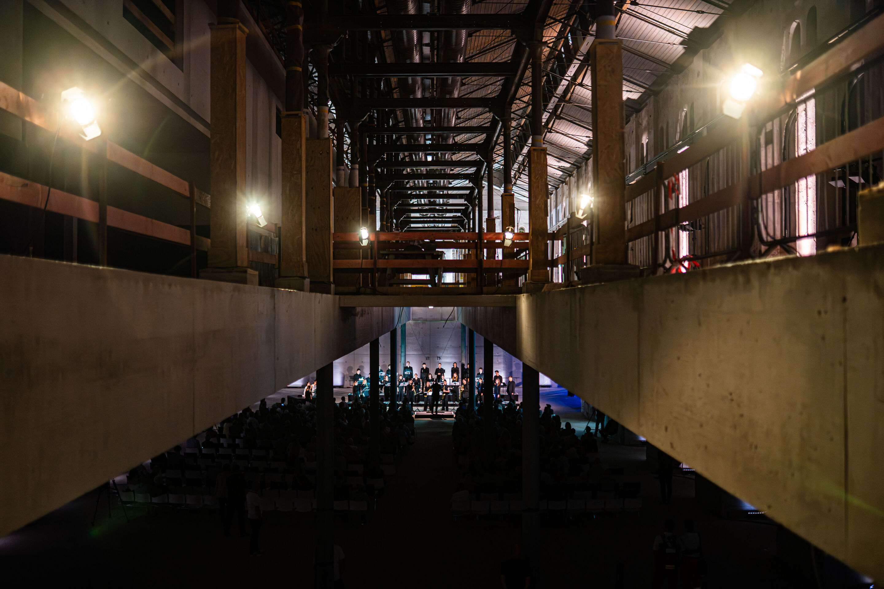 “Lux!”: Theatrical concert at the construction site of the MCAD; Arcis Saxophone Quartet, vocal ensemble LauschWerk - On the construction site of the new Museum of Concrete Art and Design Ingolstadt, the view from the upper floor looks through the open...