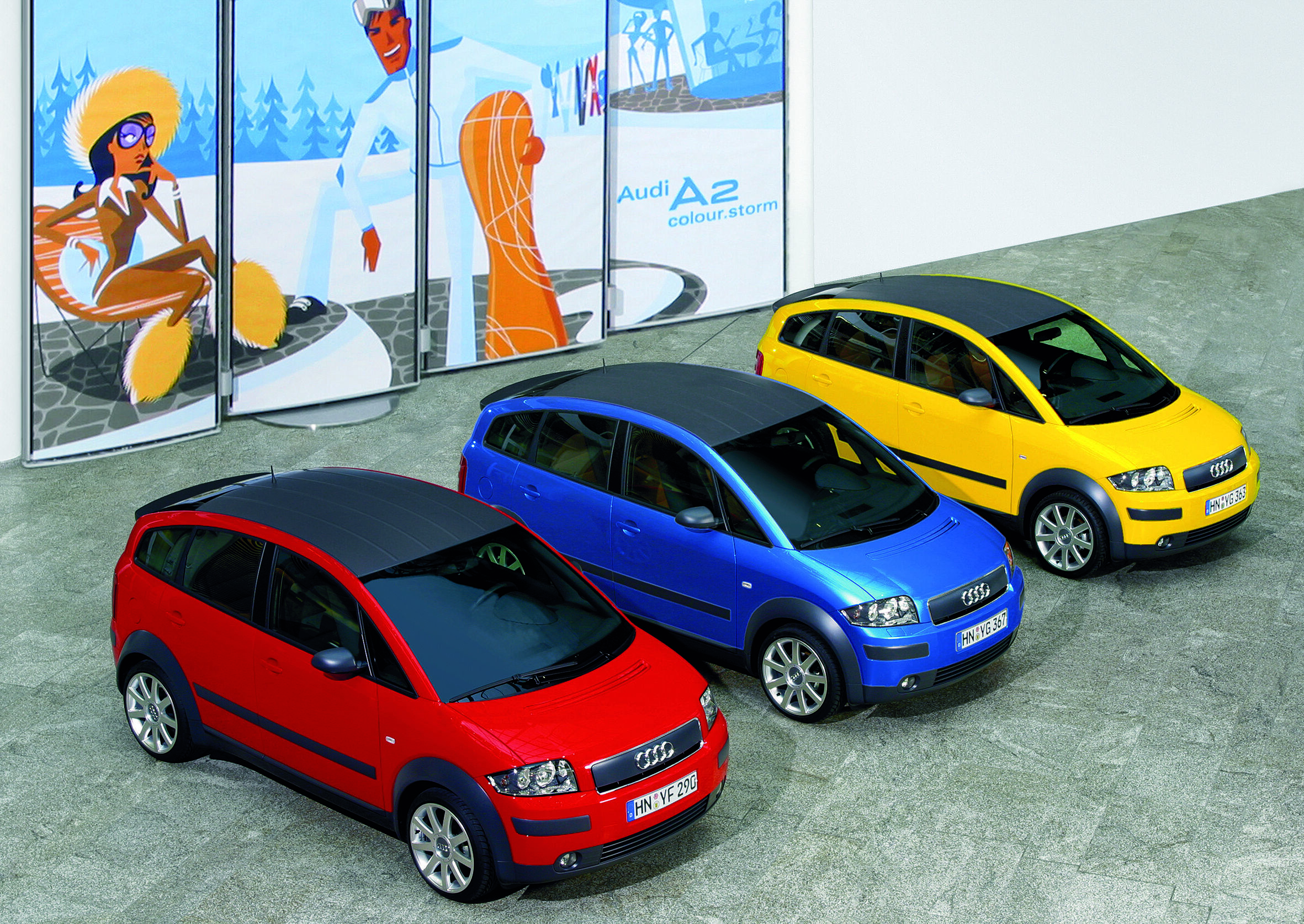 Leading light: 25 years Audi A2 - The Audi A2 was launched in 2000 – 25 years ago. The picture shows the special “colour.storm” edition in Misano red pearl effect, Sprint blue pearl effect and Imola yellow. (from left)