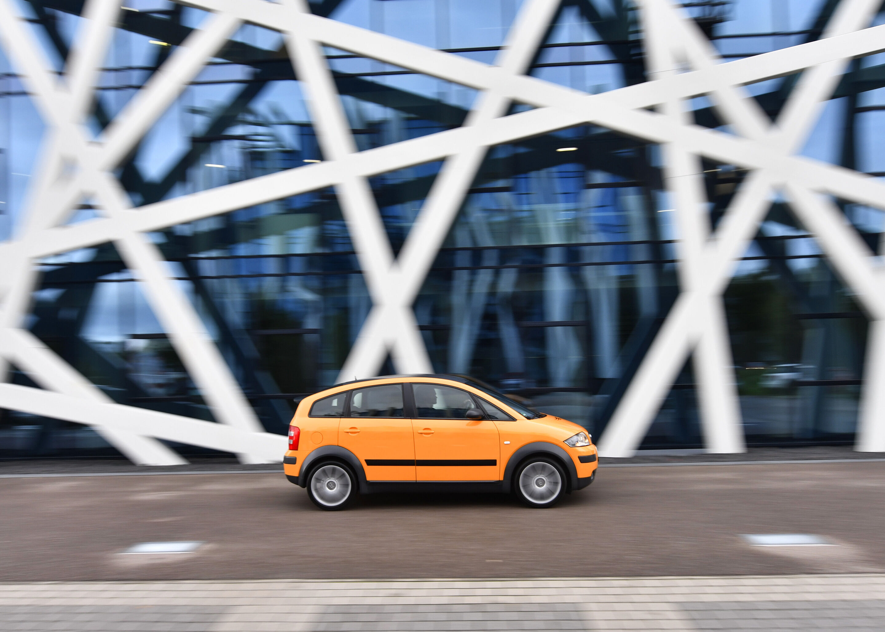 Leading light: 25 years Audi A2 - The Audi A2 was launched in 2000 – 25 years ago. The picture shows a side view of the special “colour.storm” edition in Papaya orange, dynamic outdoor shot.