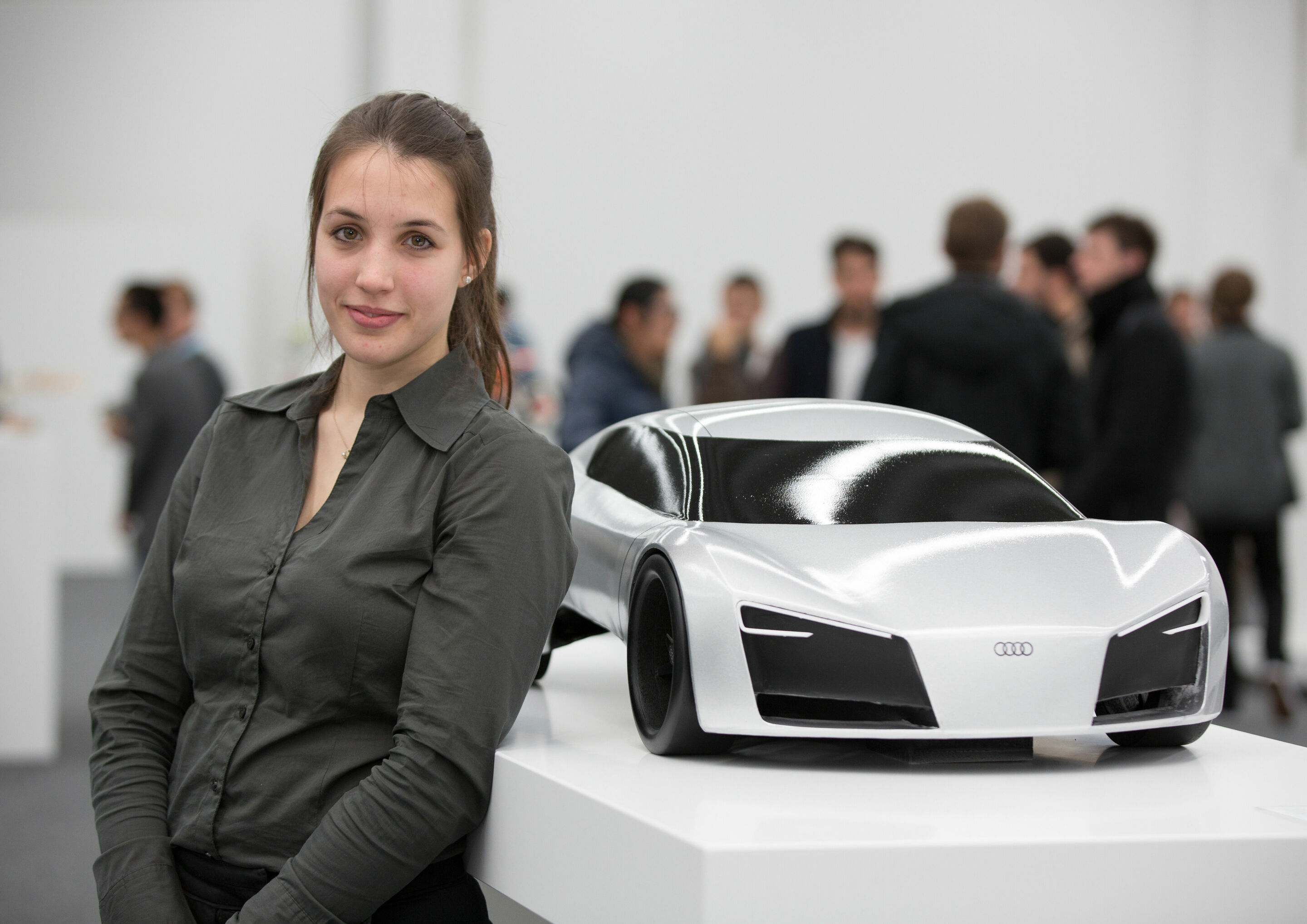 Audi Hosts Design Universities - Student Vanessa Woznik from the University of Art and Design Offenbach with her “GT” model, created for the university’s “Dream Car” cooperation project with Audi.