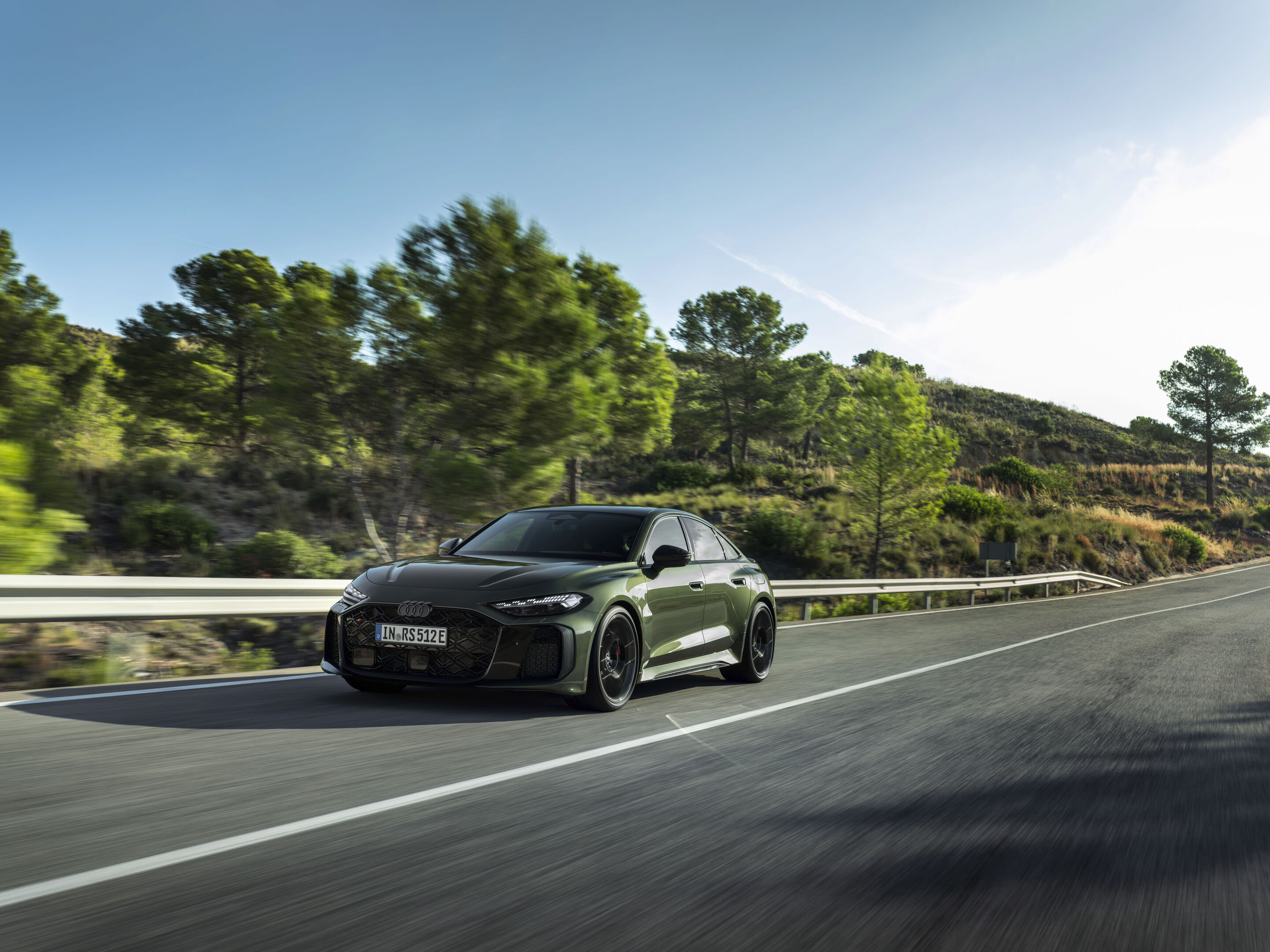 Audi RS 5 Sedan - Bedford green metallic, outdoor dynamic photo, exterior, three-quarter front view