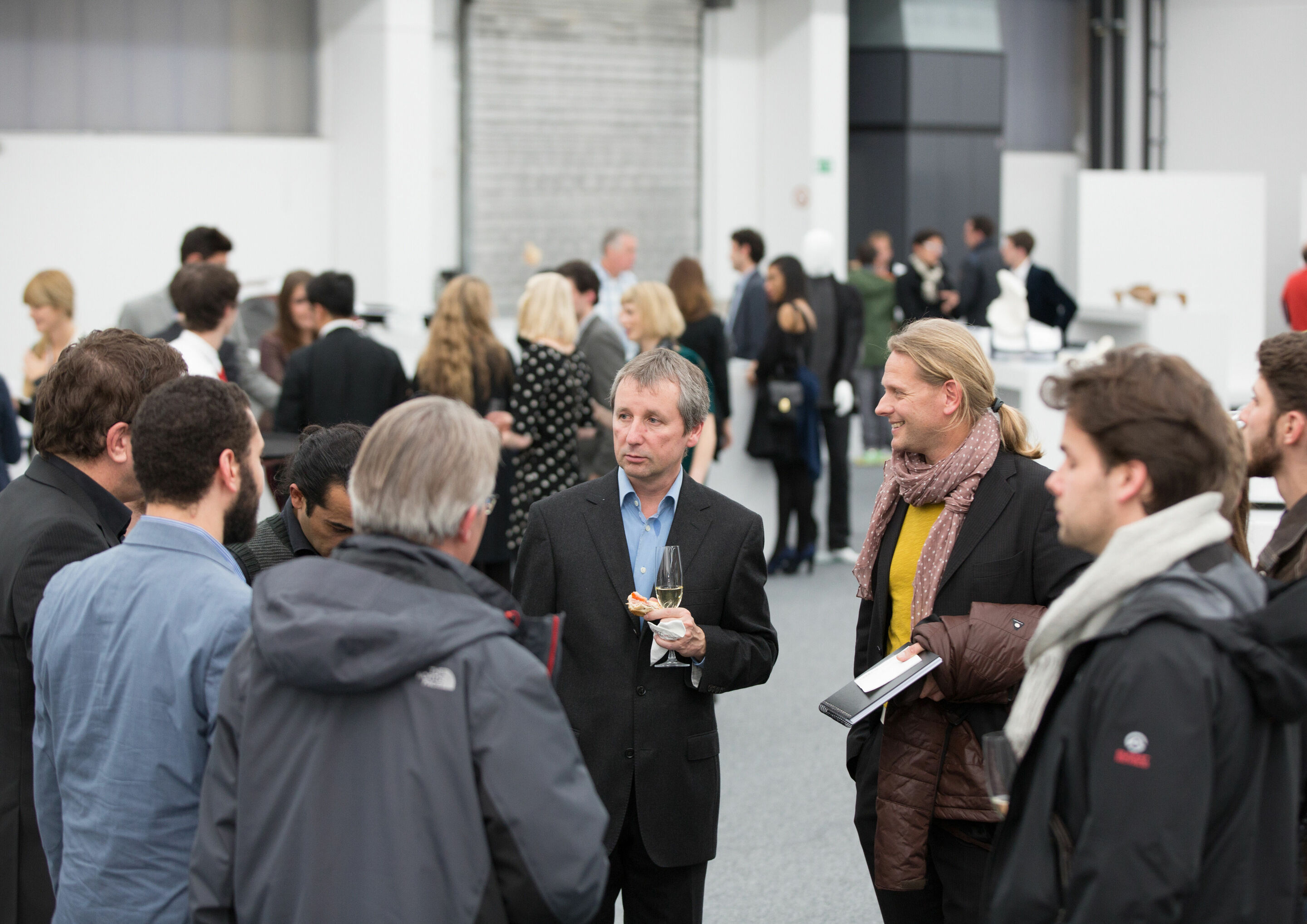 Audi Hosts Design Universities - Klemens Rossnagel, Advisor for Audi’s university cooperation projects, in dialog with Achim Badstübner, Head of Exterior Design, and students from the design academies.