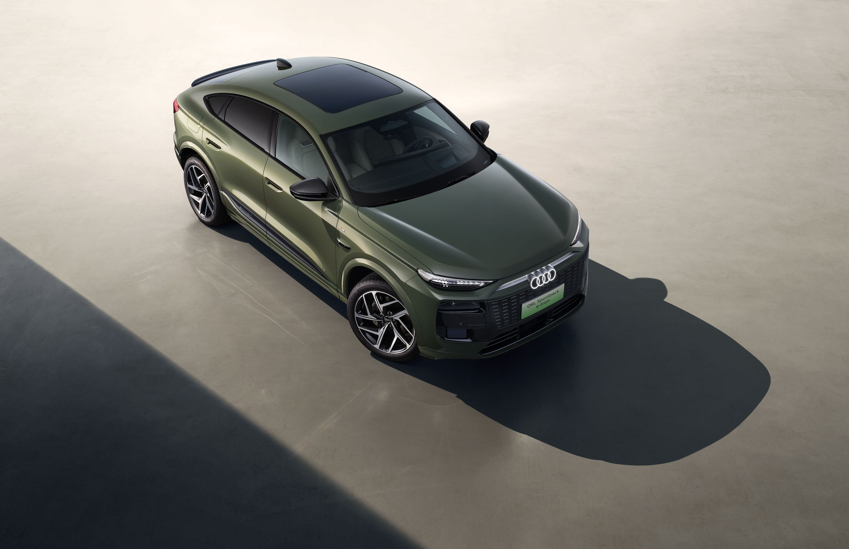 Audi at Auto China 2026 - Audi Q6L Sportback e-tron, studio static shot, exterior, elevated view with focus on the roofline