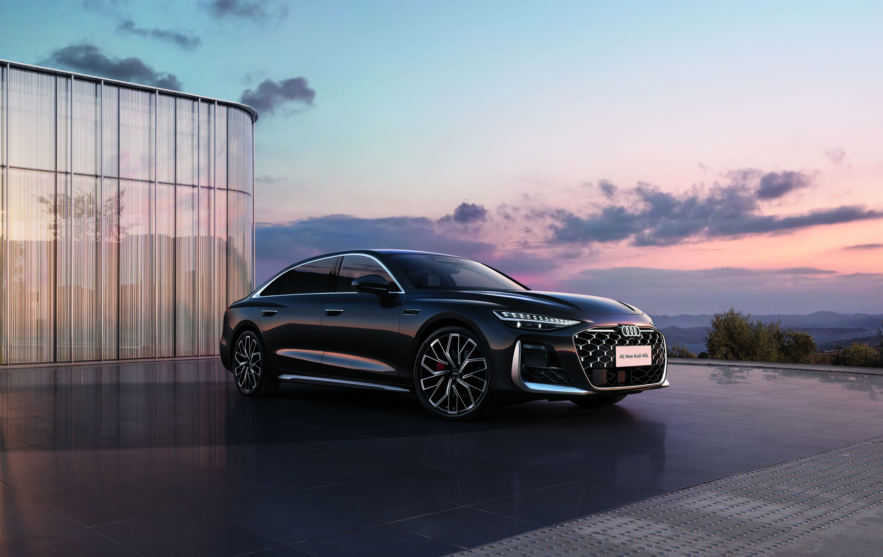 Audi at Auto China 2026 - Audi A6L, outdoor static shot, exterior, three-quarter front view with an architectural background