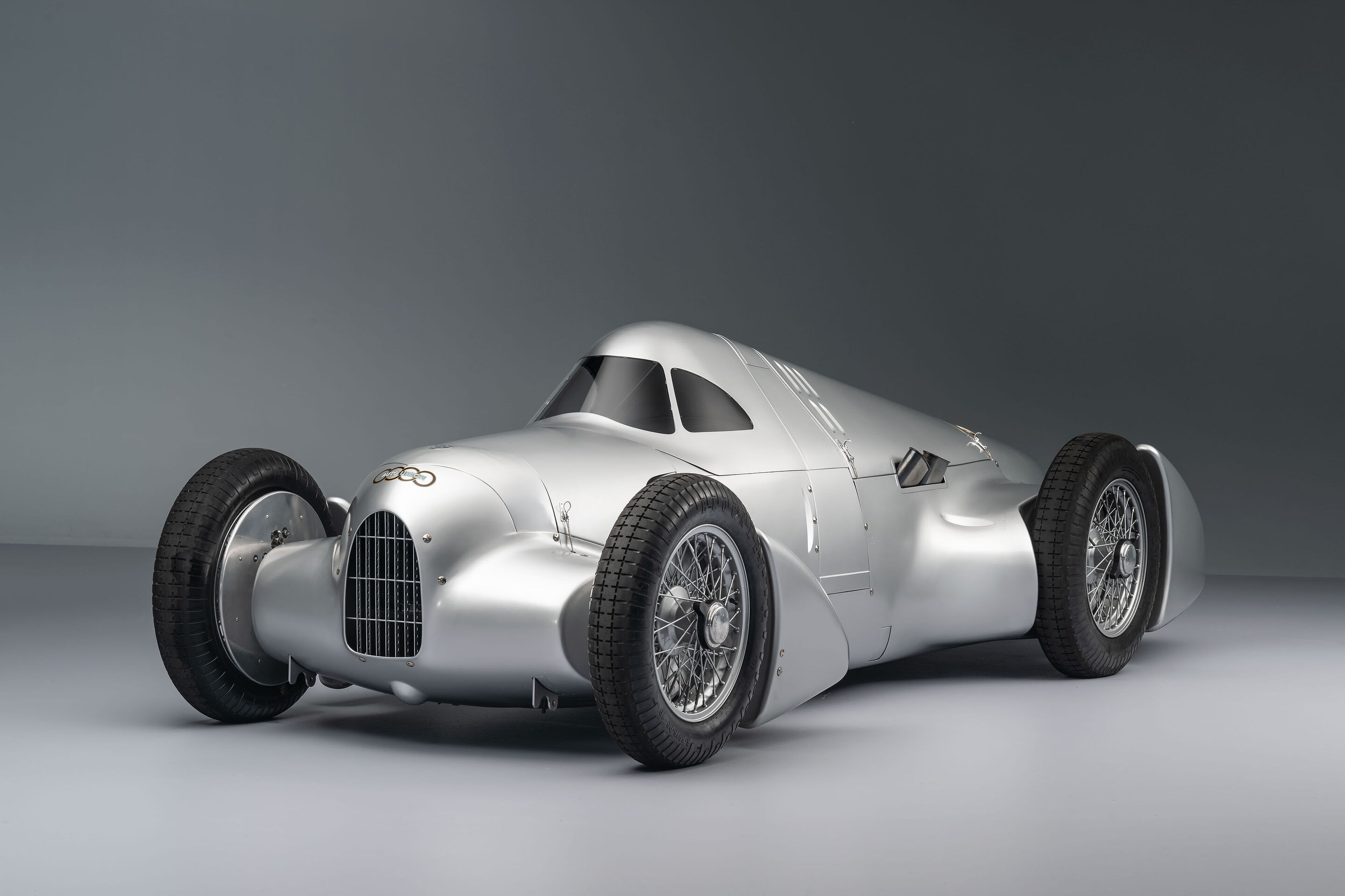 Auto Union Lucca - Audi recreated the Auto Union Lucca. After just over three years of construction, the record-breaking car was completed in early 2026. Studio shot of the Avus configuration of the car. Side view.