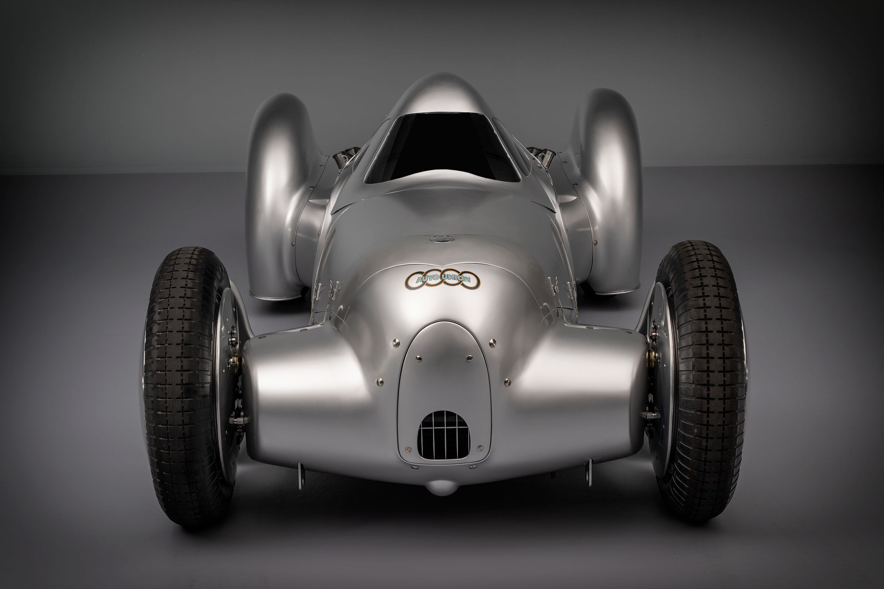 Auto Union Lucca - Audi recreated the Auto Union Lucca. After just over three years of construction, the record-breaking car was completed in early 2026. Studio shot. Front view.