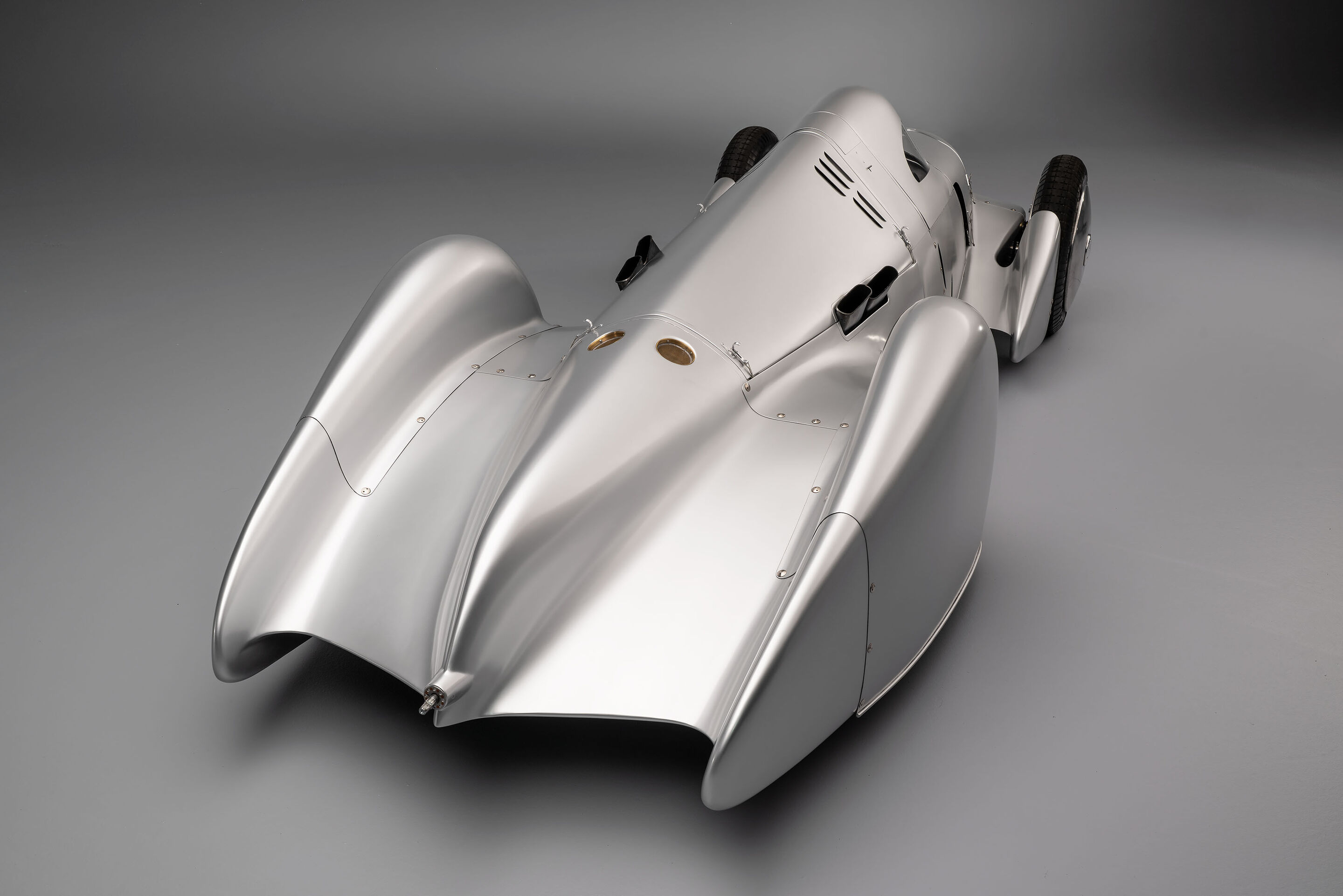Auto Union Lucca - Audi recreated the Auto Union Lucca. After just over three years of construction, the record-breaking car was completed in early 2026. Studio shot. Rear view.