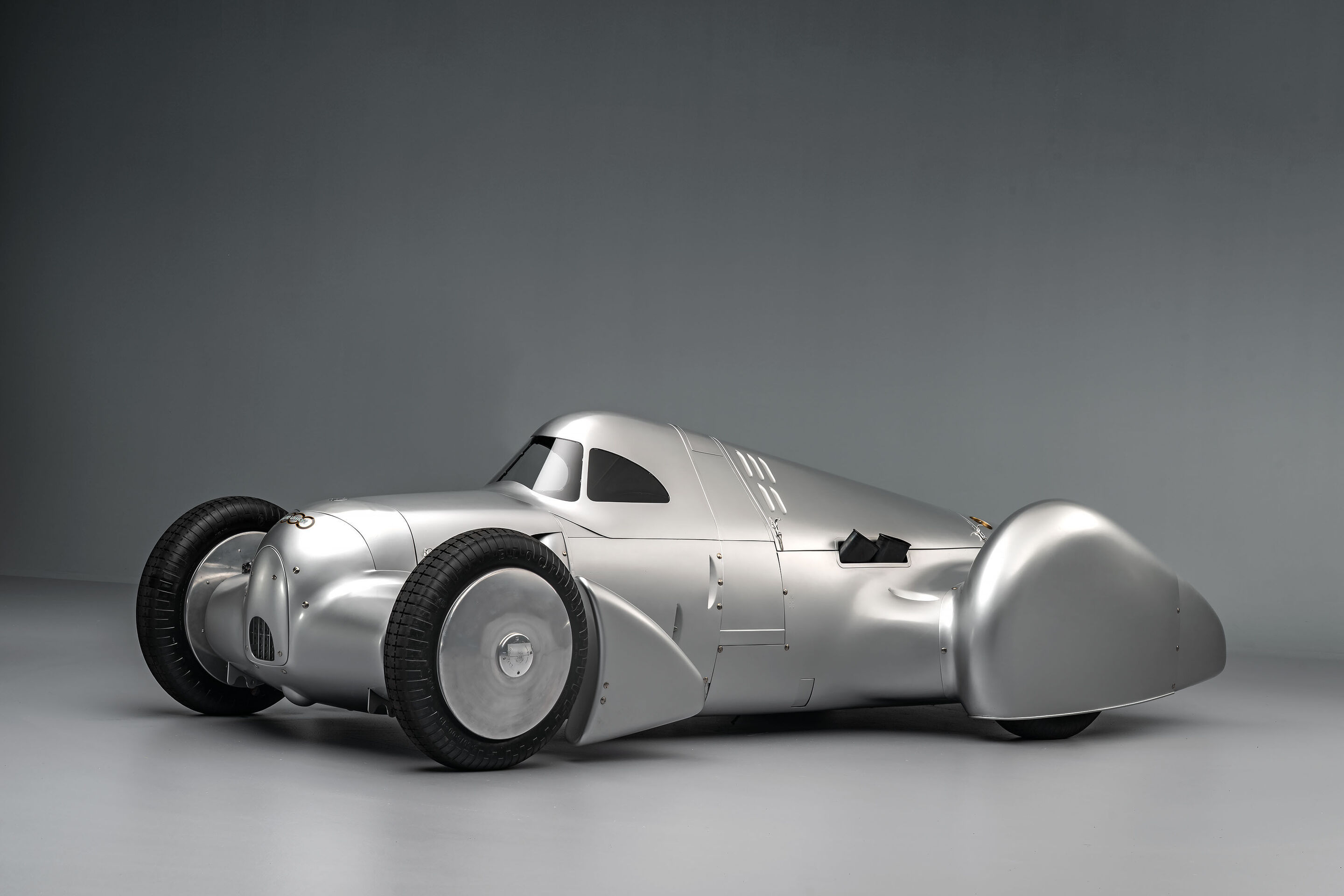 Auto Union Lucca - Audi recreated the Auto Union Lucca. After just over three years of construction, the record-breaking car was completed in early 2026. Studio shot. Side view.