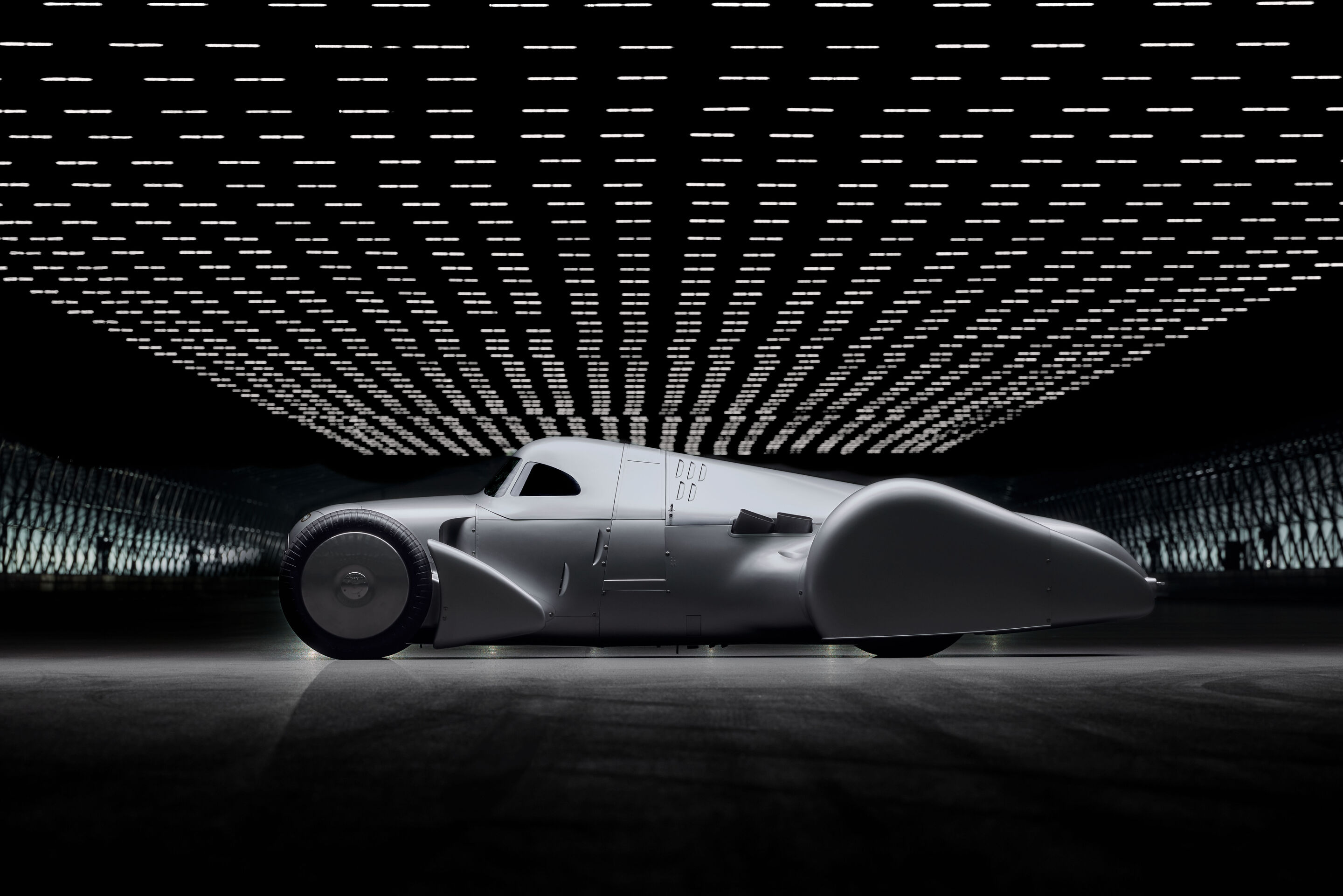 Auto Union Lucca - Audi recreated the Auto Union Lucca. After just over three years of construction, the record-breaking car was completed in early 2026. Studio shot. Side view.