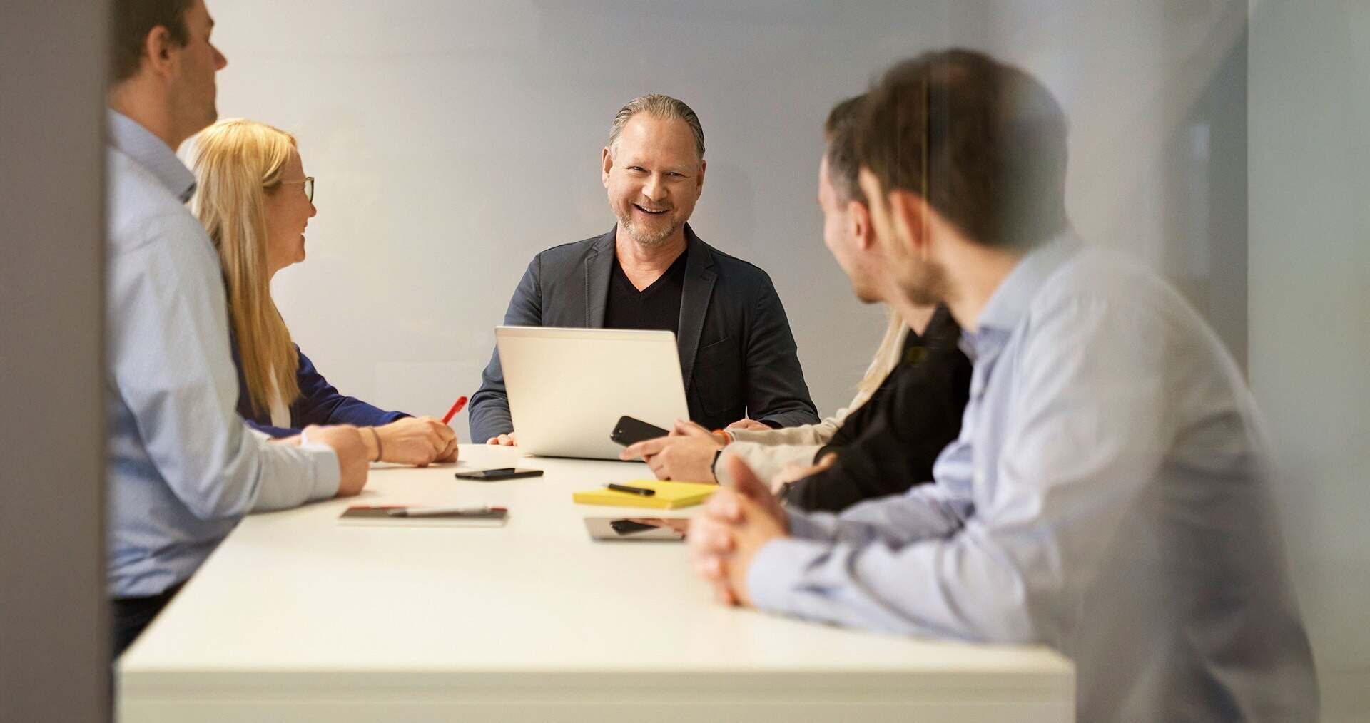 Team meeting at a conference counter