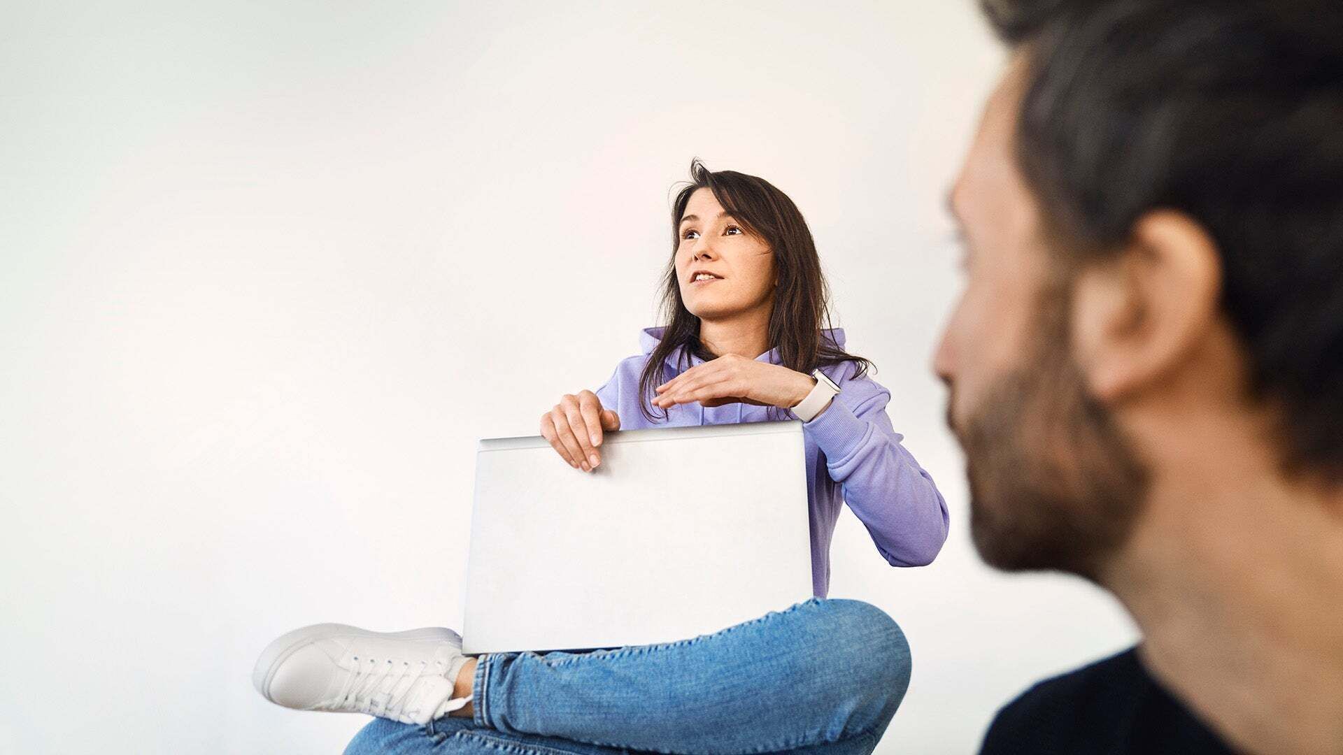 Woman sitting on chair with her laptop
