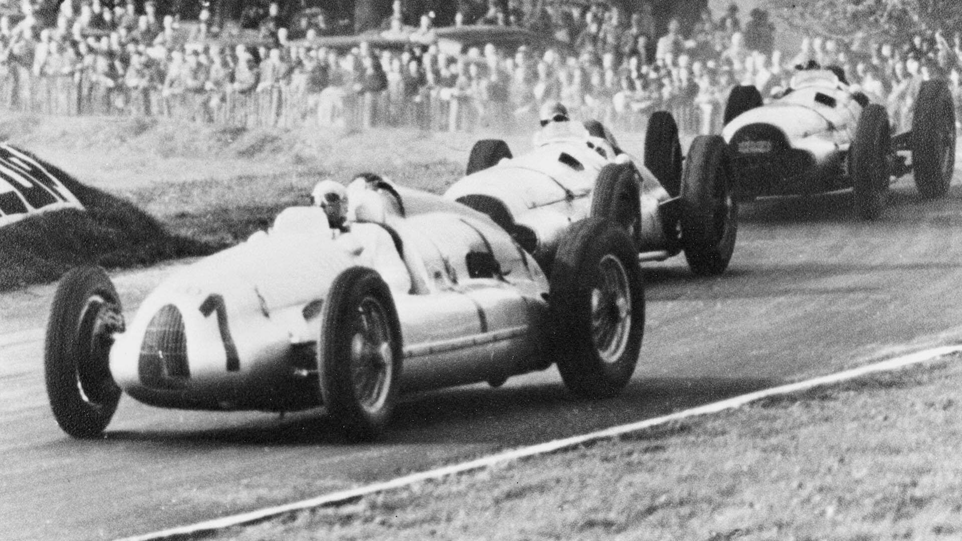 A picture of an Auto Union Type D Grand Prix race car on track at Donington in 1938.