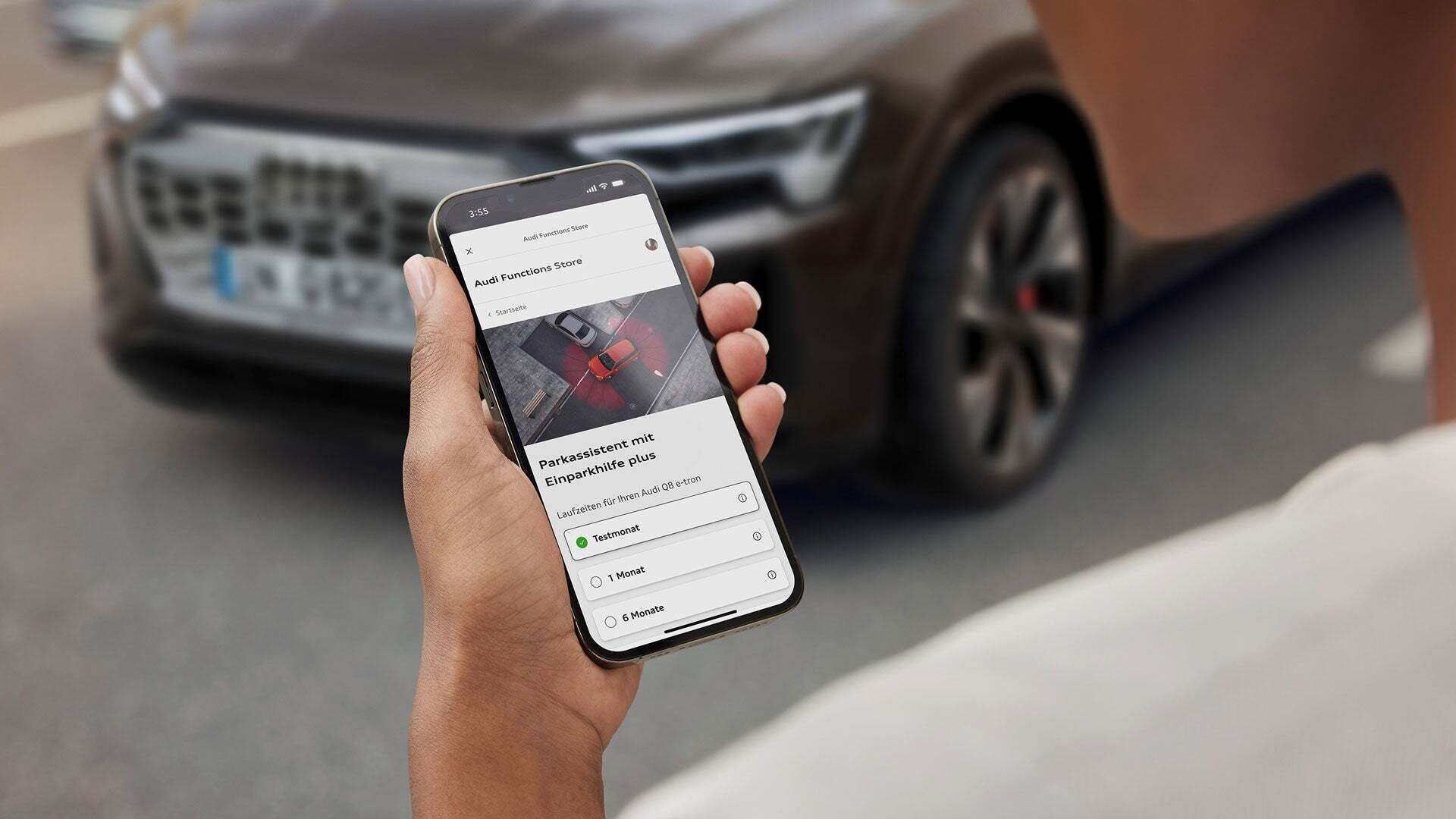 Smartphone Display zeigt den Bestellen-Bildschirm des Park-Assistenten mit Einparkhilfe plus. Die Option "Testmonat" ist angewählt.