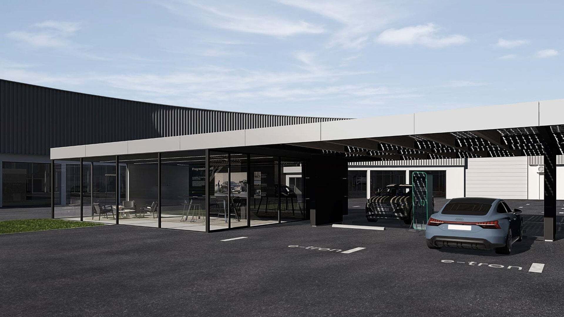 Two electric cars are parked under a solar roof charging station next to a modern, glazed building with seating.
