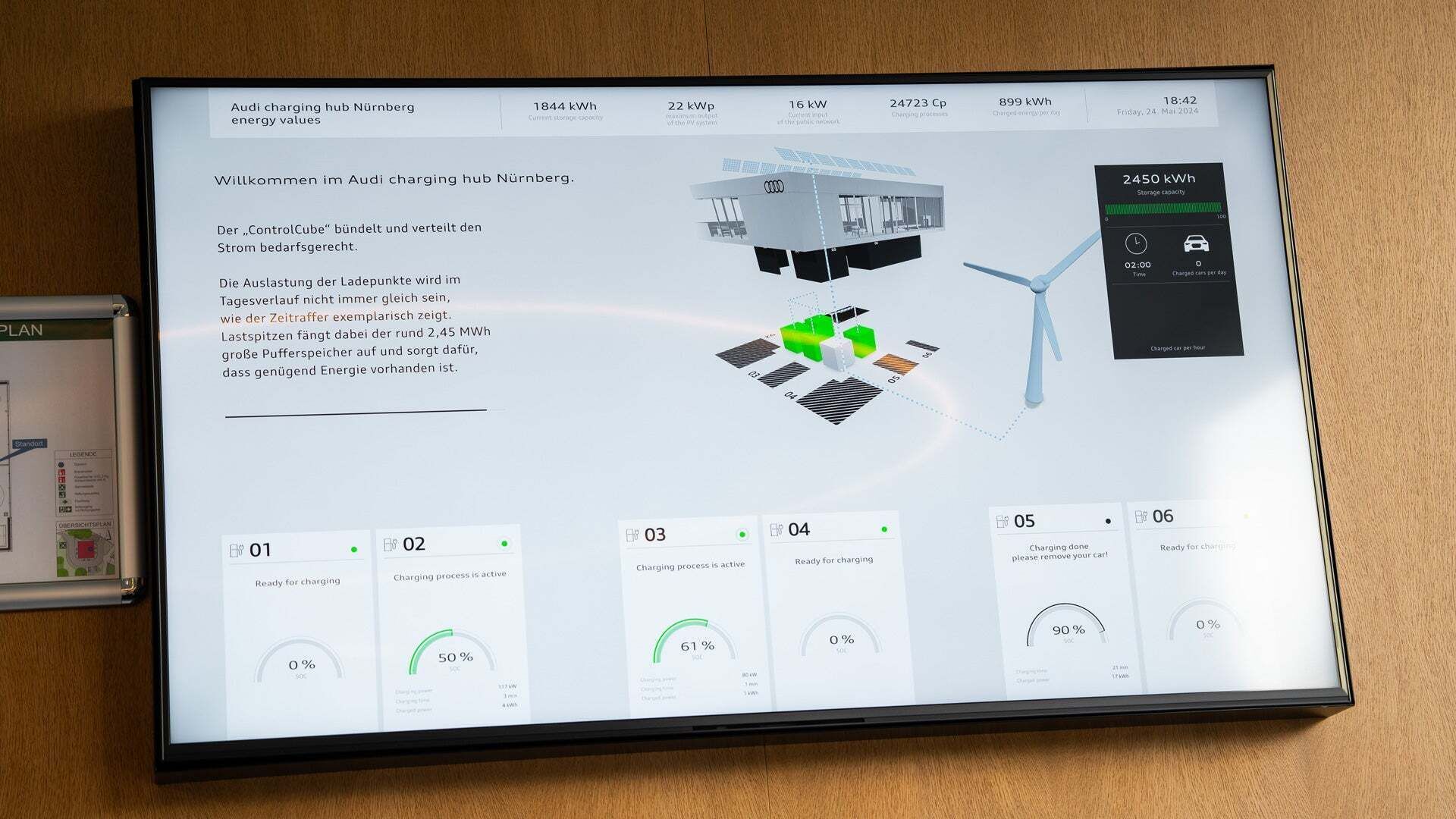A tablet with information about the Audi charging hub